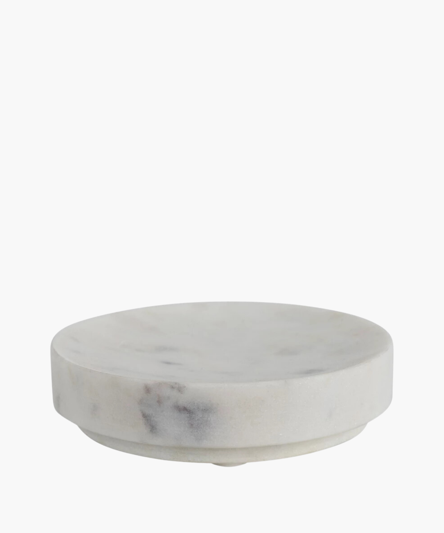 Round white marble soap dish with subtle gray veining. The smooth texture conveys simplicity and elegance. | Wildwood Home Co.