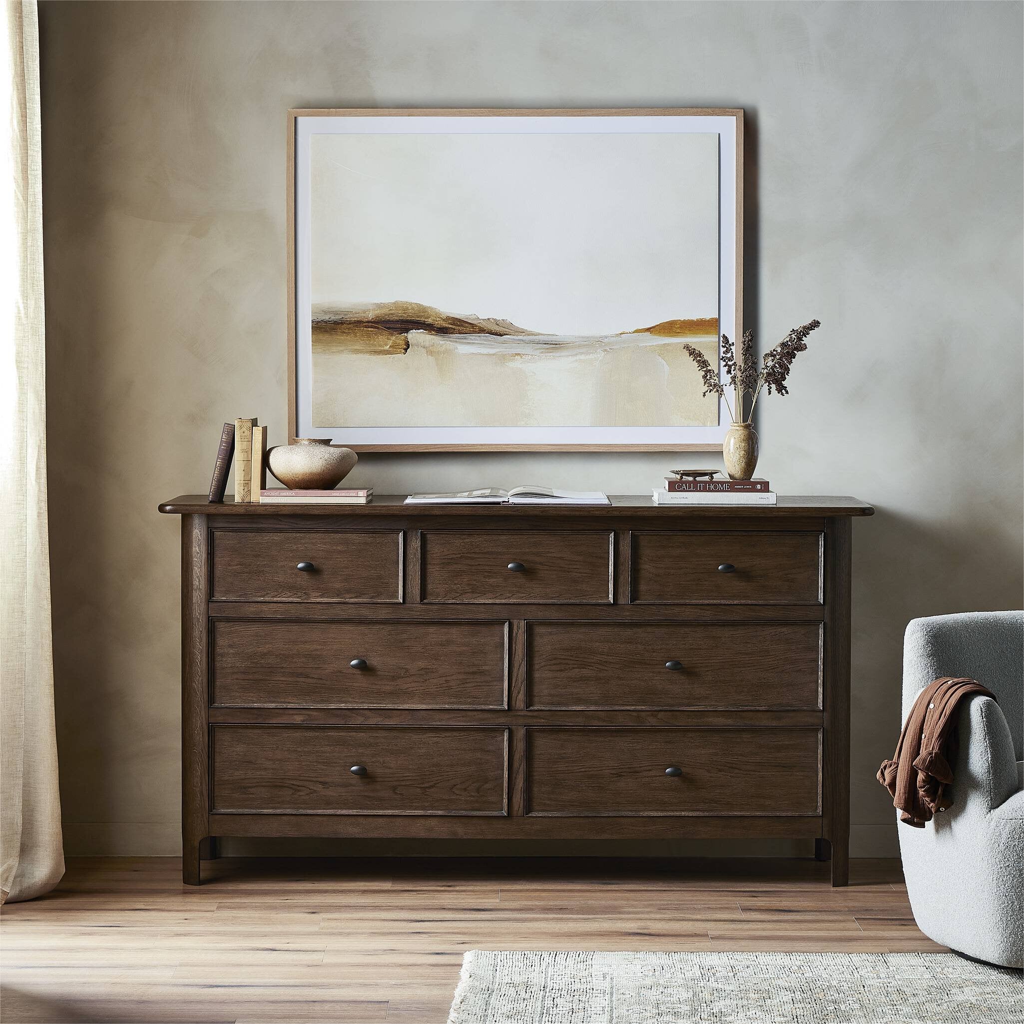 Wooden dresser with decorative items in a room setting. | Wildwood Home Co.