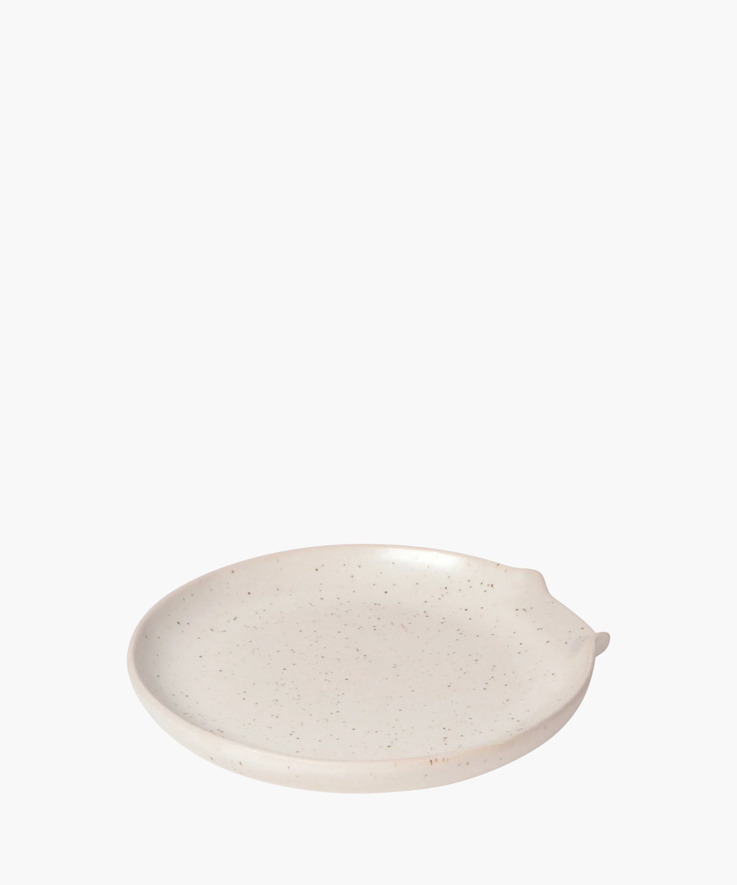A round, beige ceramic spoon rest with a slightly raised rim and subtle speckled texture on a white background. The tone is simple and minimalist. | Wildwood Home Co.