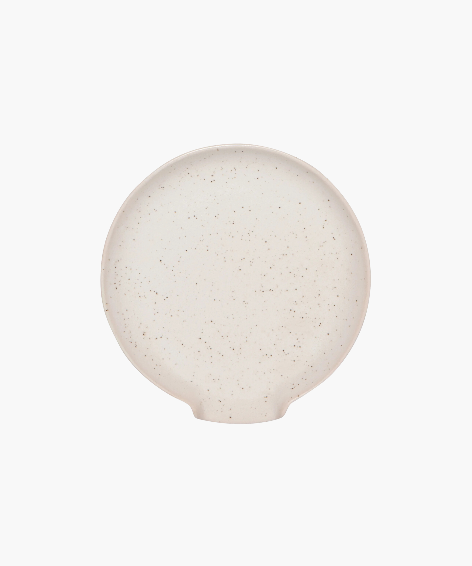 Overhead view of a round, beige ceramic spoon rest with a slightly raised rim and subtle speckled texture on a white background. The tone is simple and minimalist. | Wildwood Home Co.