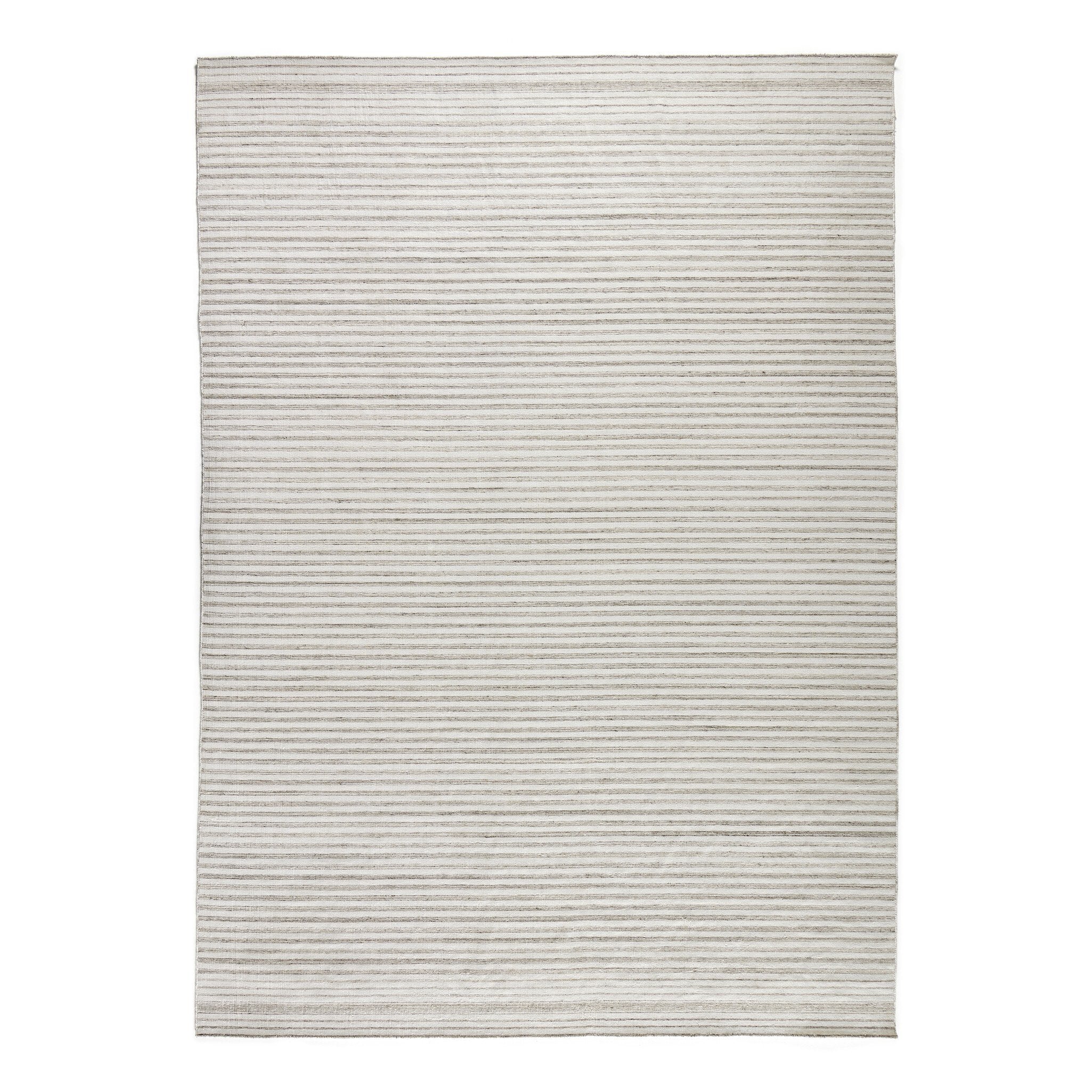 Rectangular outdoor rug with a striped pattern on a white background.