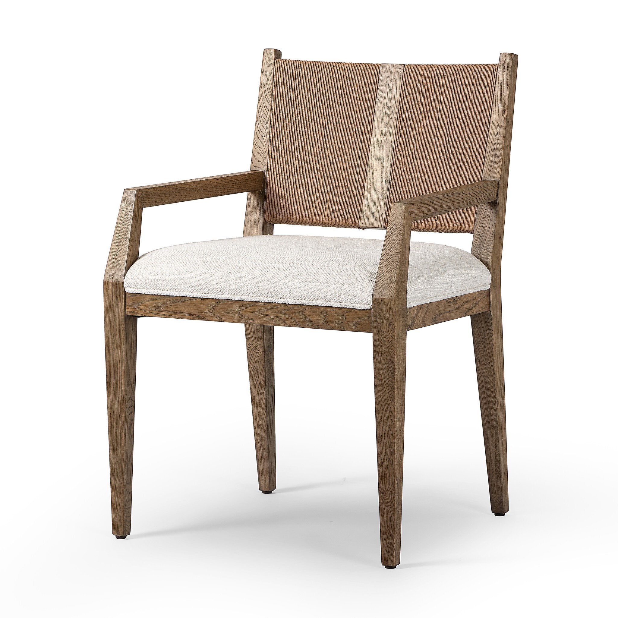 Wooden dining arm chair with woven backrest and white cushion on a white background.