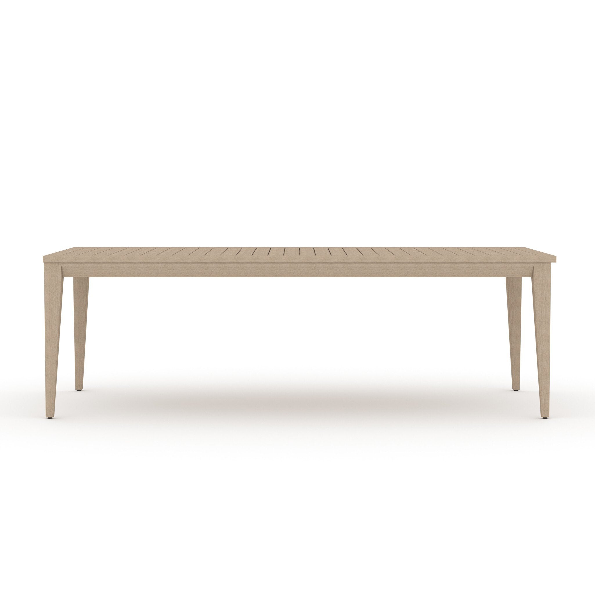 Washed brown outdoor dining table on a white background. | Wildwood Home Co.