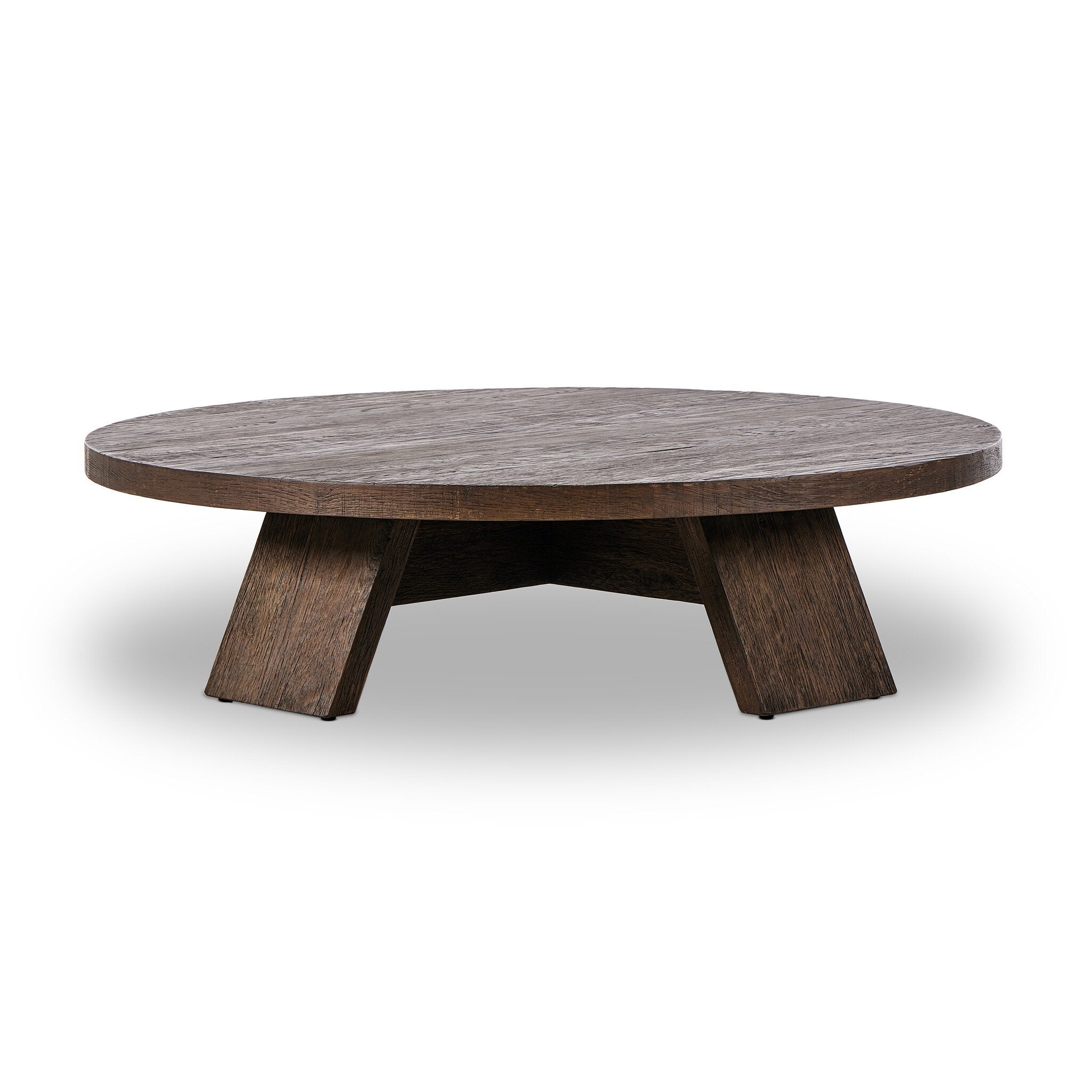Round wooden coffee table on a white background. | Wildwood Home Co.
