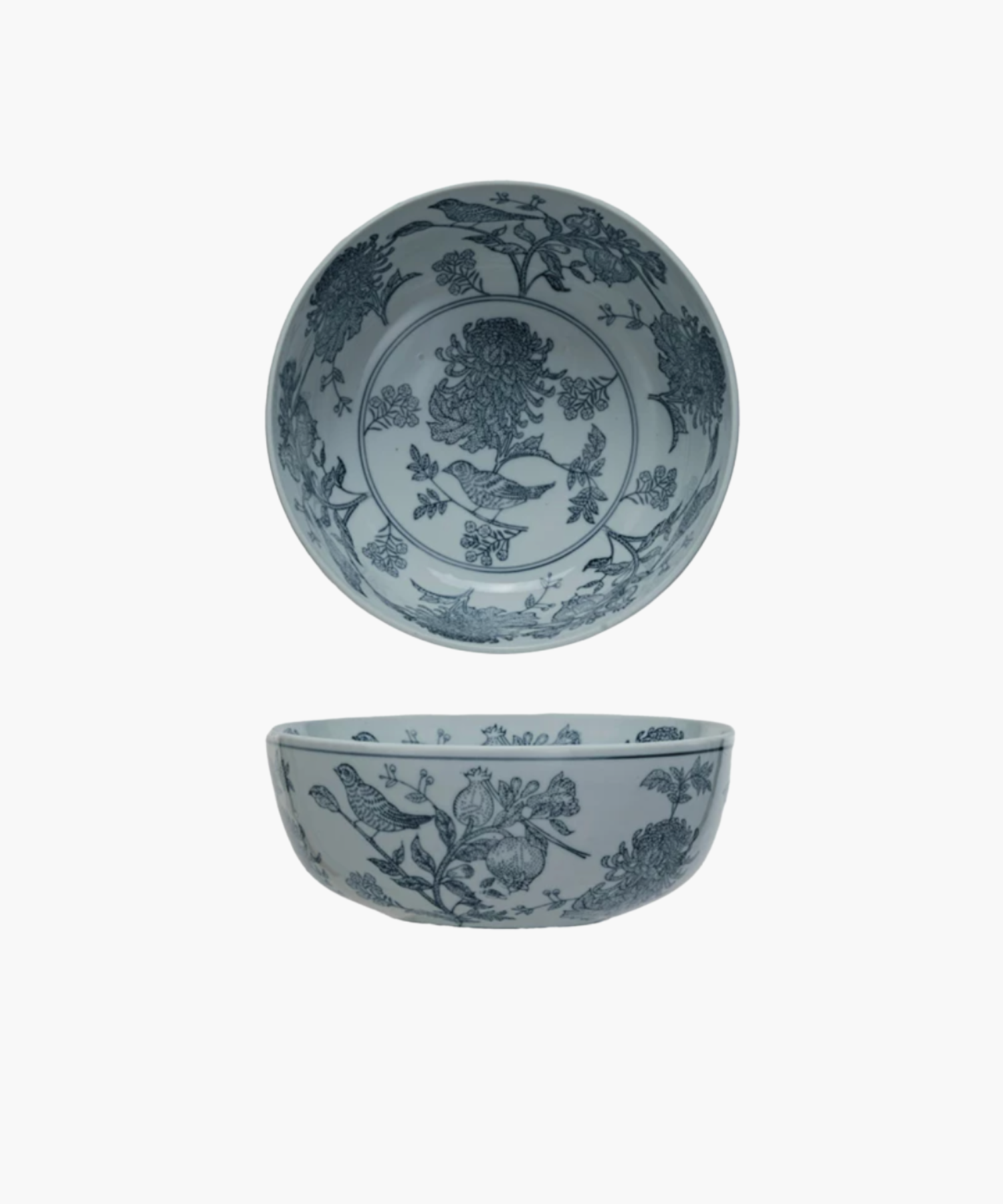 Two ceramic bowls are displaying the intricate blue floral and bird motifs from the inside and the side of the bowl. | Wildwood Home Co.
