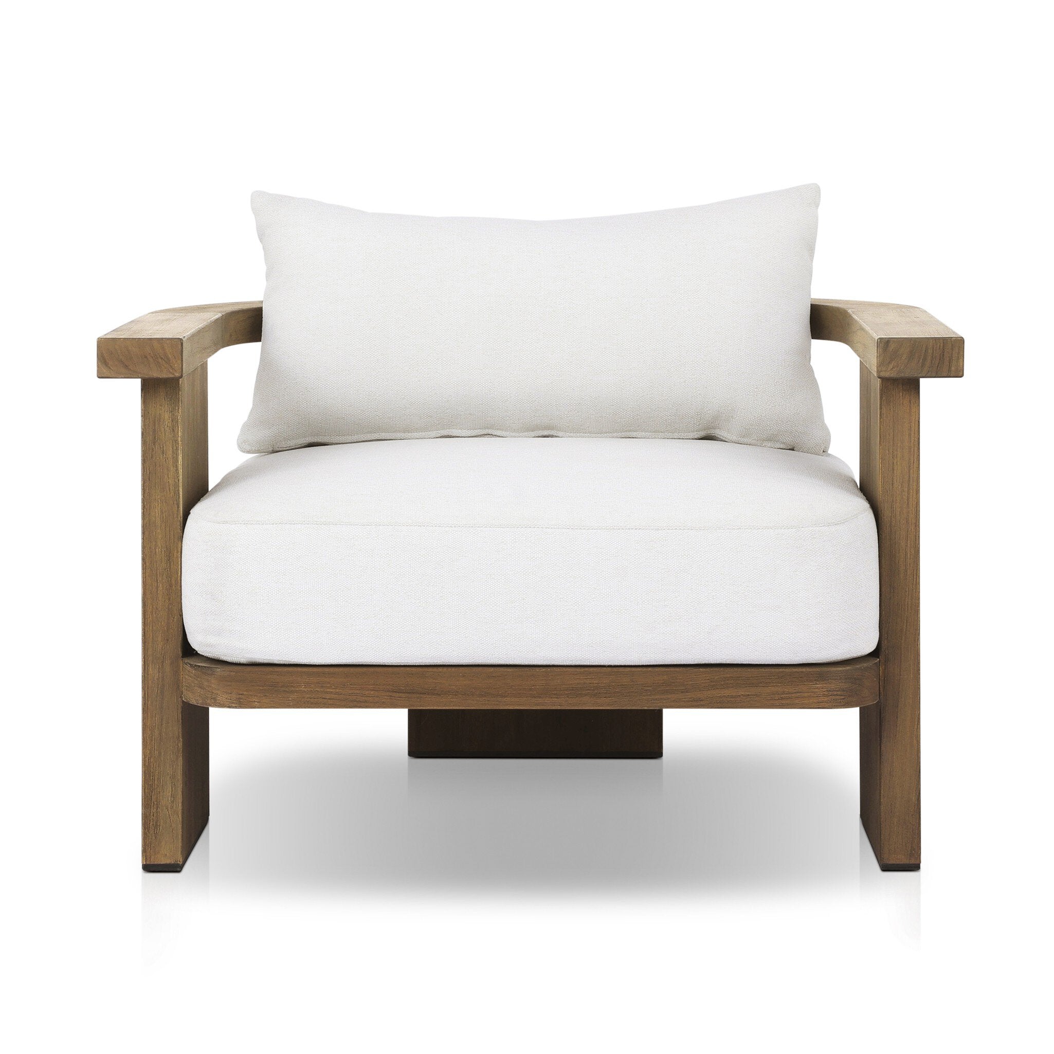 Outdoor armchair with a curved wooden frame out of teak and white linen cushions on a white background. | Wildwood Home Co.
