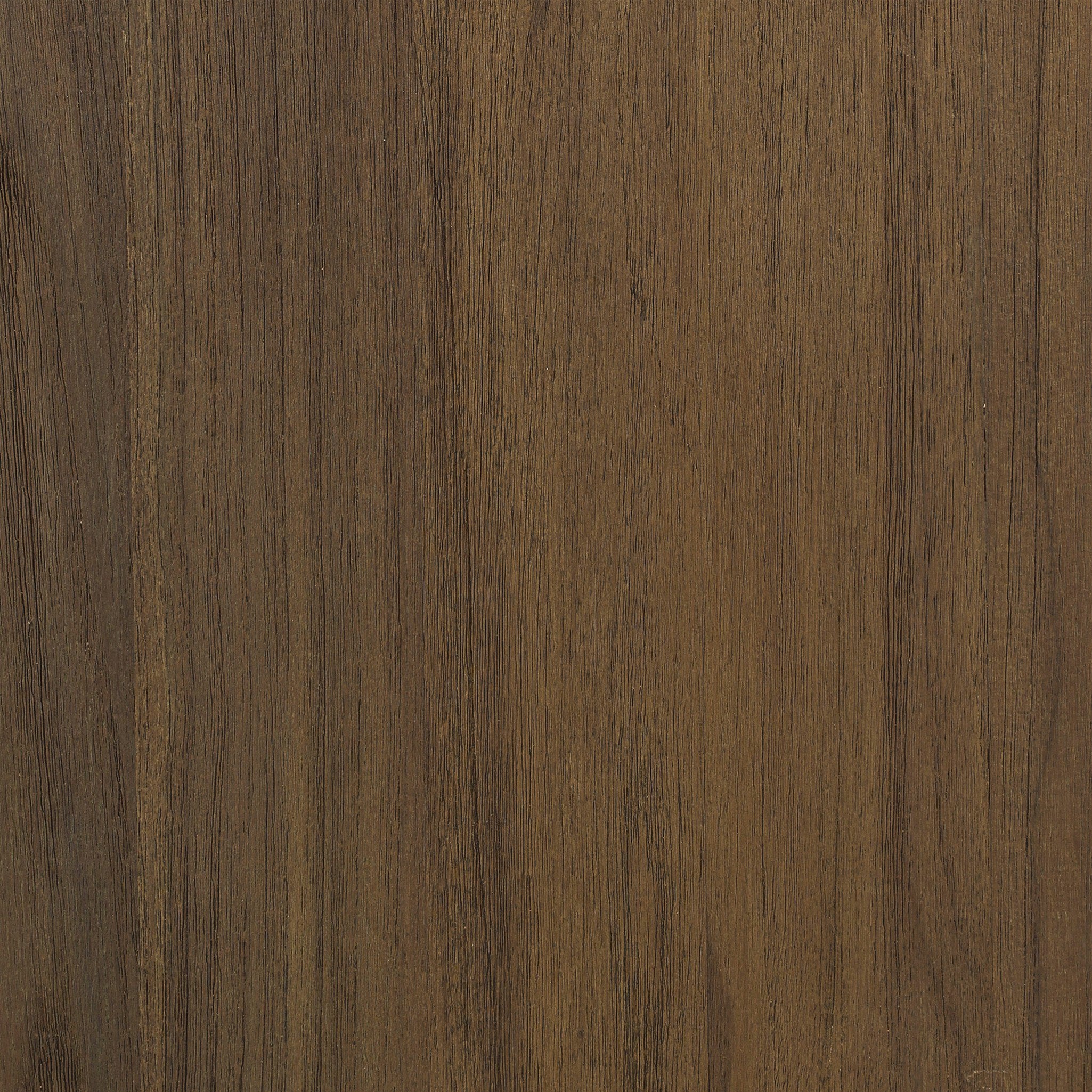 Close up of the teak frame from the outdoor sofa showing its color and graining.