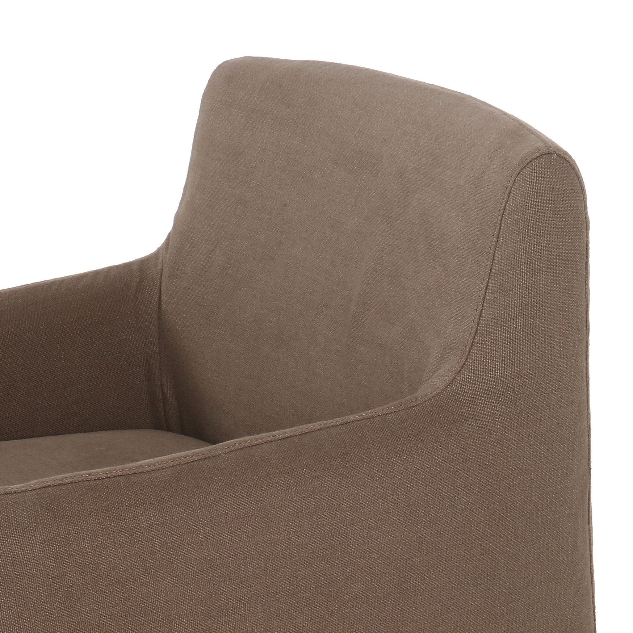 Close up of a slipcovered dining chair in an earthy mushroom brown hue with rounded arms on a white background.