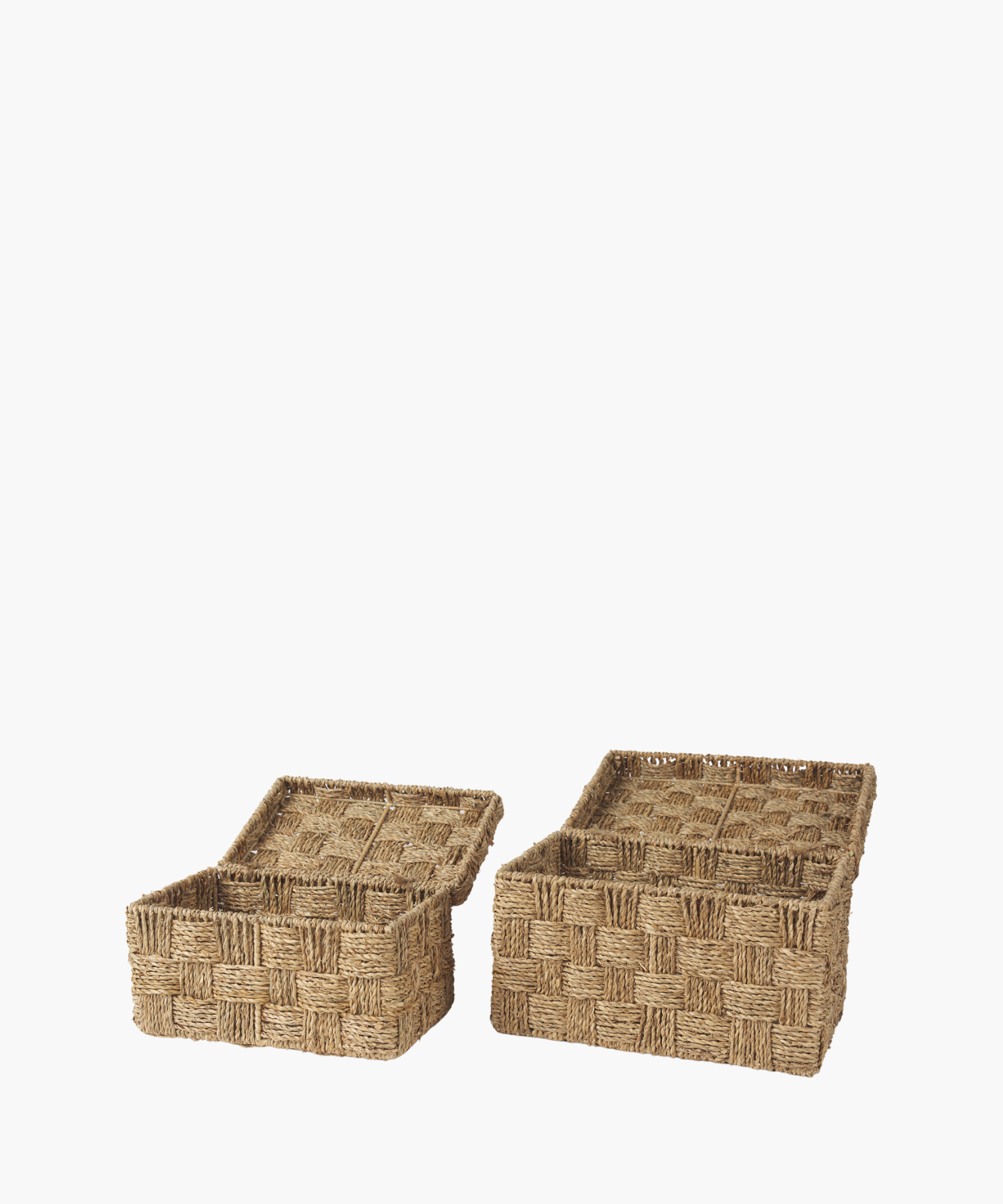 Two open woven baskets made of natural fiber with lids lie against a plain background, displaying a checkered pattern. The tone is earthy and rustic. | Wildwood Home Co.