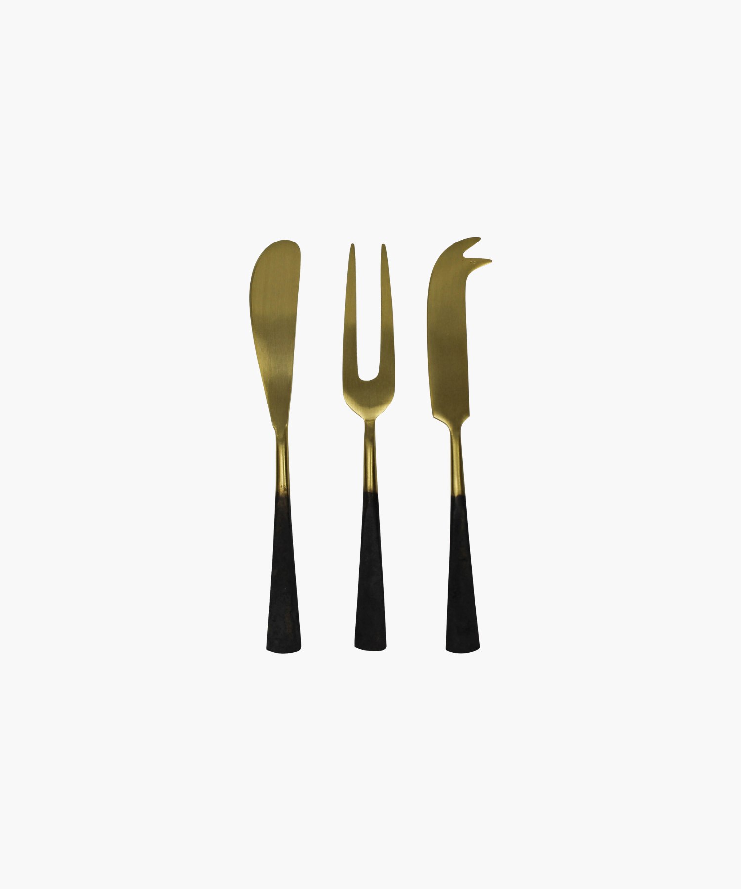Three elegant cheese knives with sleek black handles and shiny gold blades on a plain white background, exuding a modern and sophisticated tone. | Wildwood Home Co.