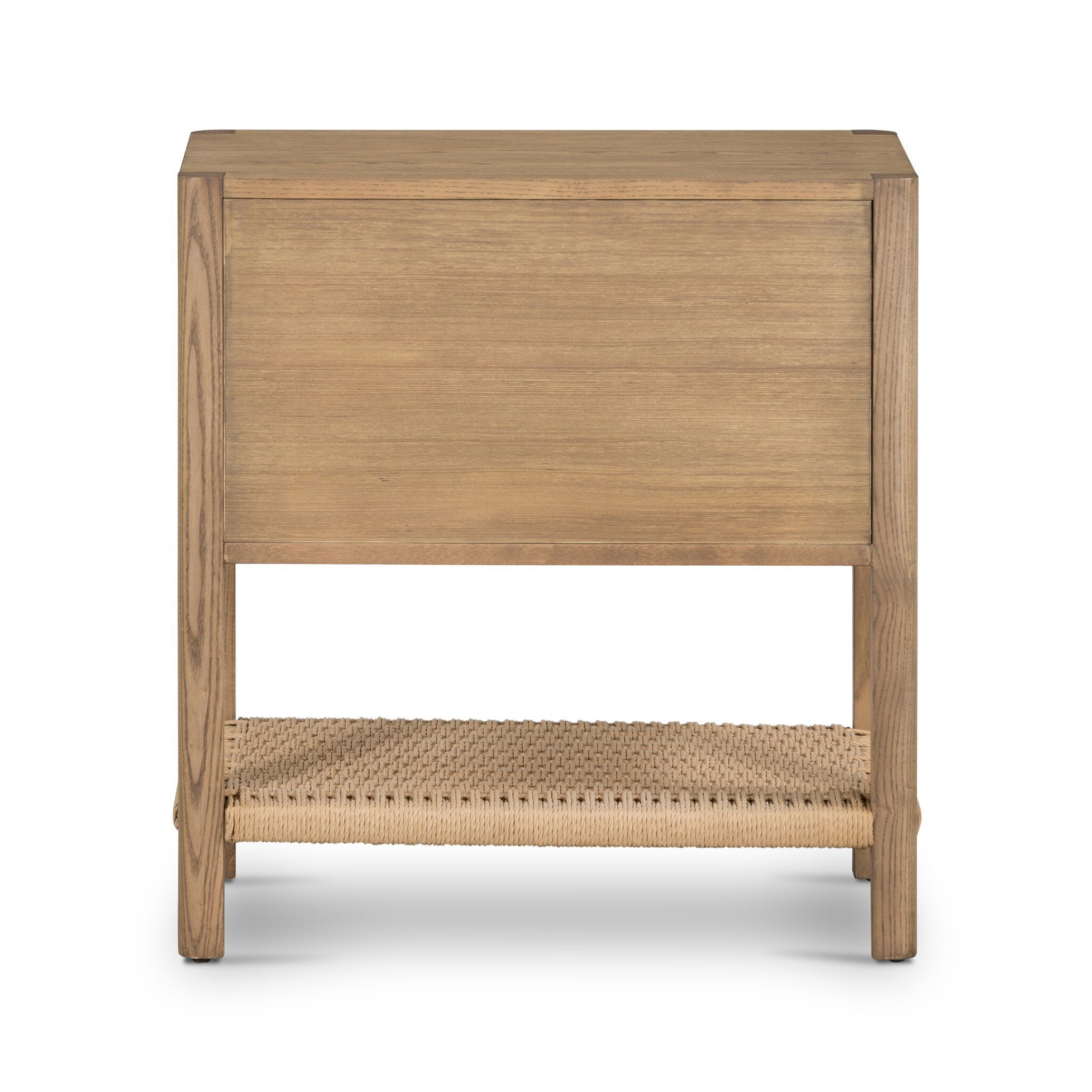 The back of a wooden nightstand with two drawers and a woven shelf on a white background.