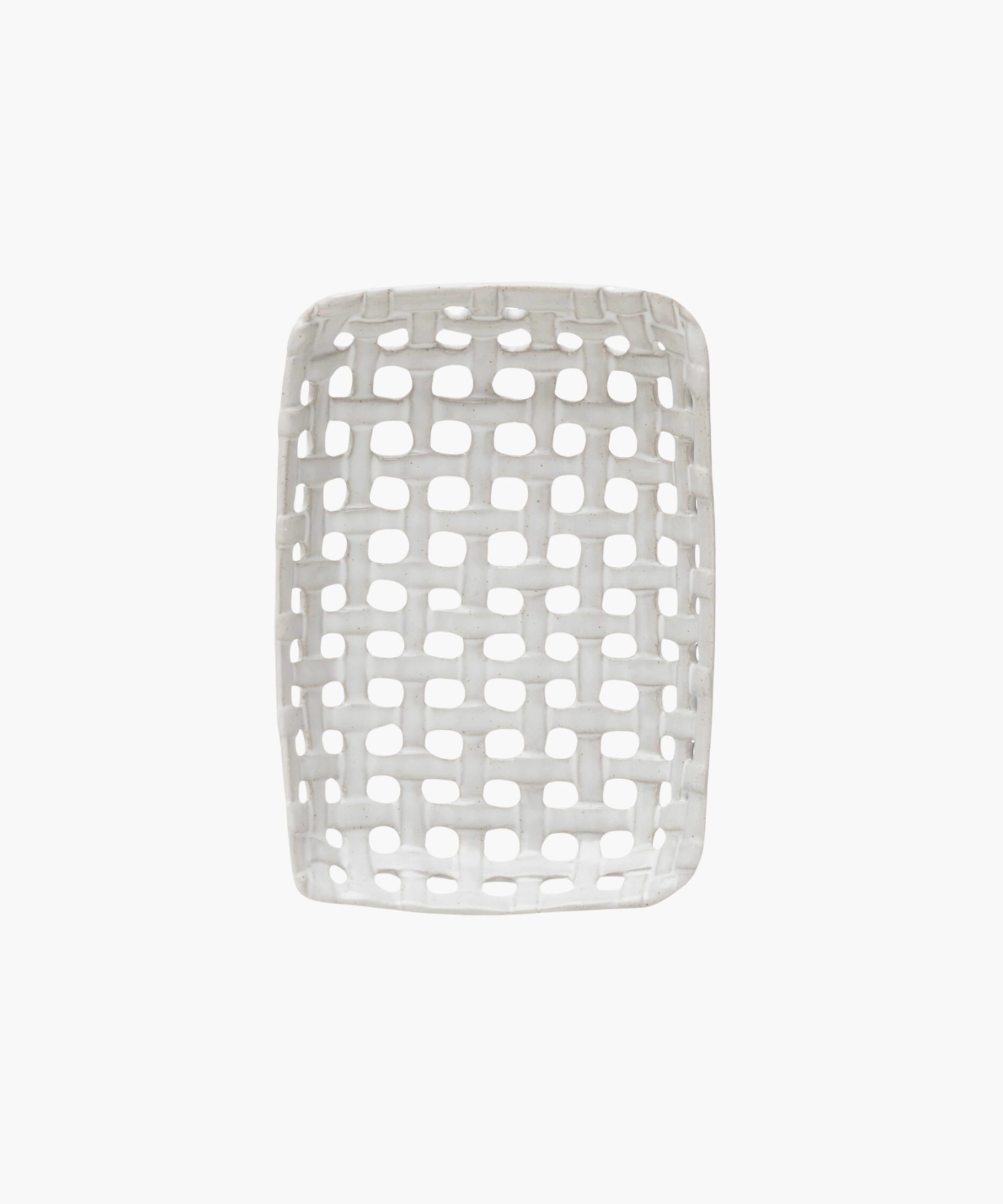 An overhead view of a white, rectangular ceramic basket dish with an open lattice design. The dish has a smooth finish and a contemporary look, evoking a minimalist style.