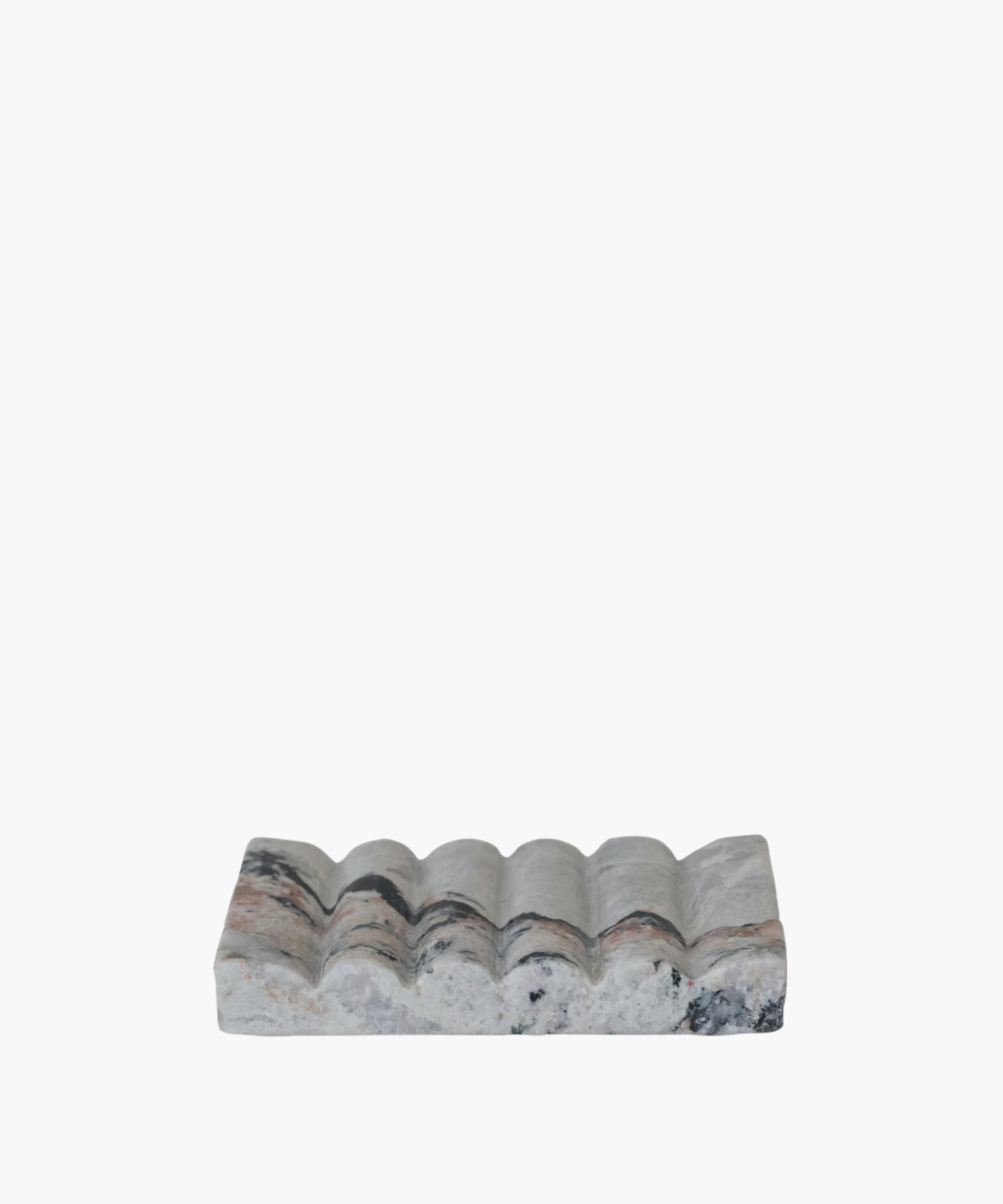 A rectangular marble soap dish with a wavy, textured surface. The stone features gray, black, and pink veins, conveying an elegant and natural aesthetic.