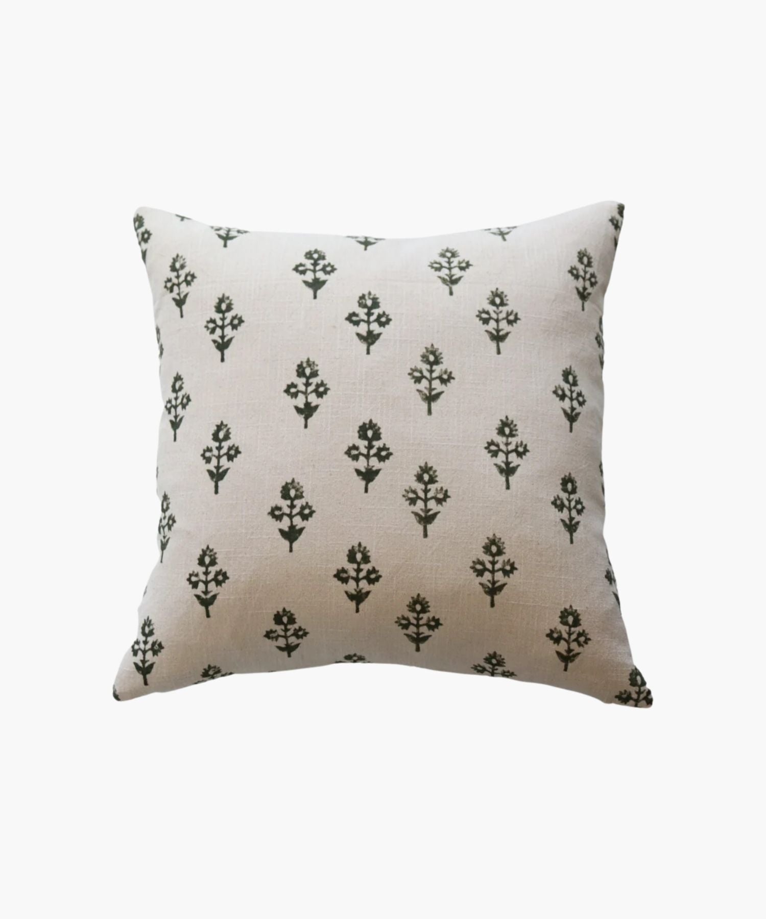 A square beige pillow with a pattern of evenly spaced, small dark green botanicals. The design is simple and calming, evoking a natural, serene atmosphere. | Wildwood Home Co.
