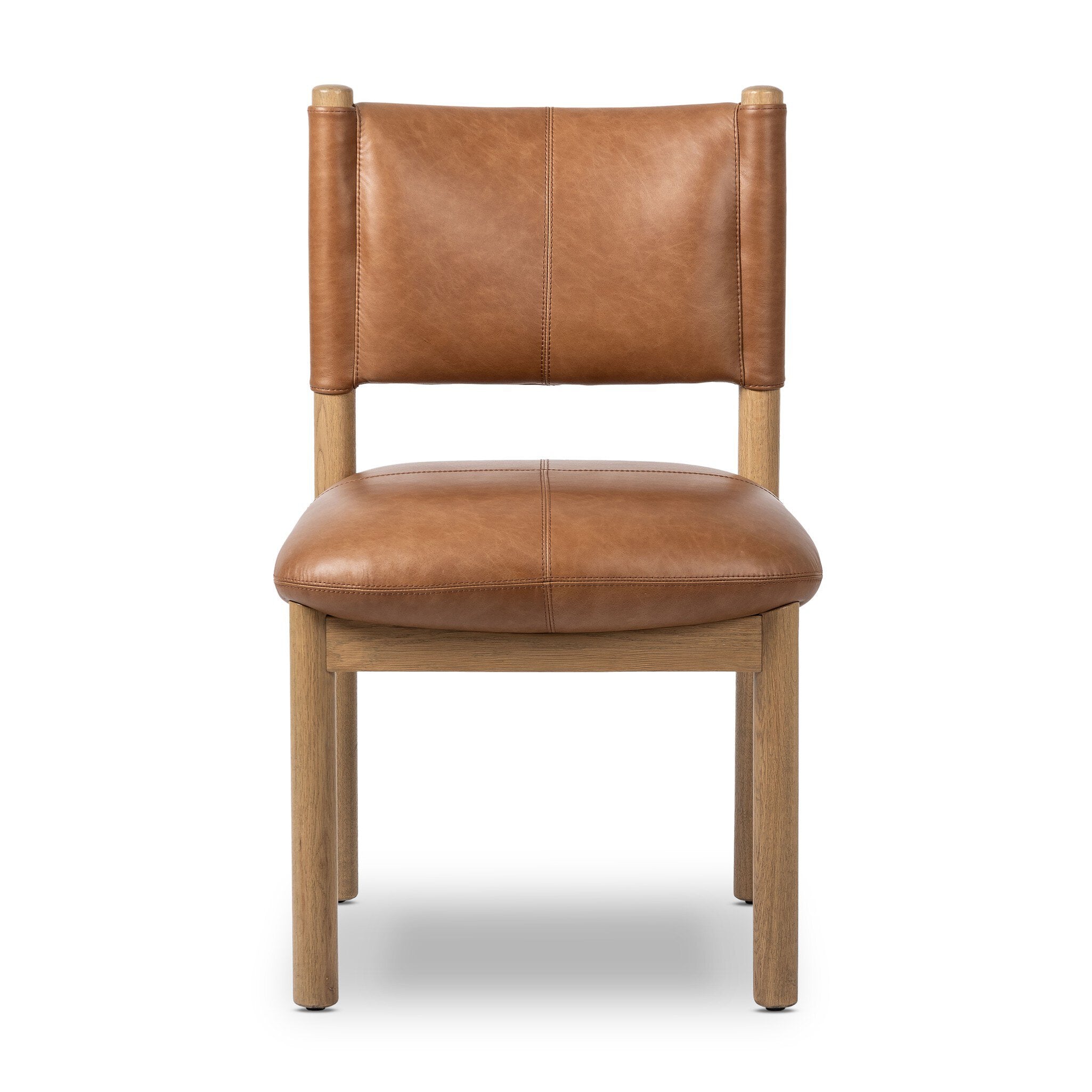 Brown leather dining chair with wooden frame on a white background. | Wildwood Home Co.