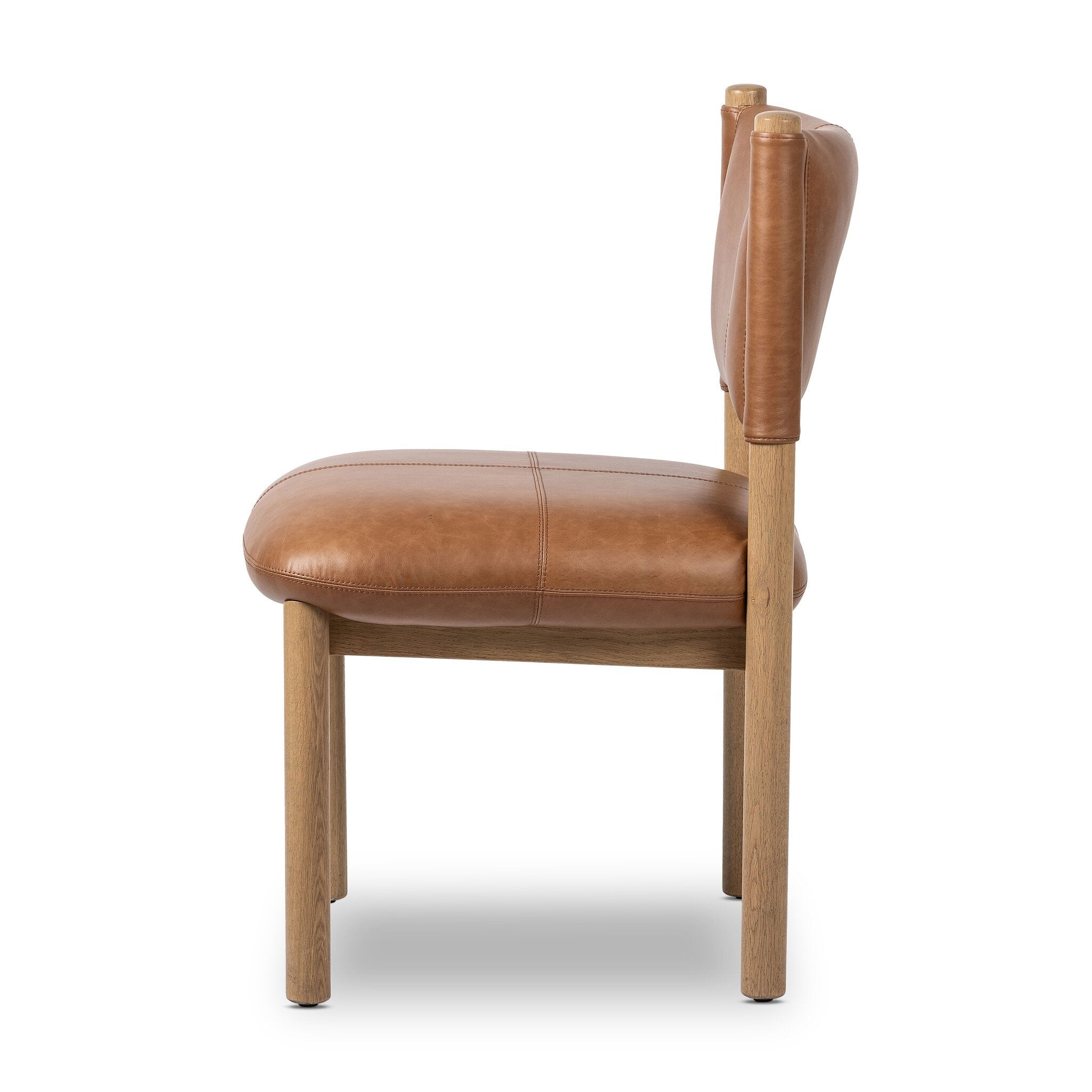 Side profile of a brown leather dining chair with wooden frame on a white background.
