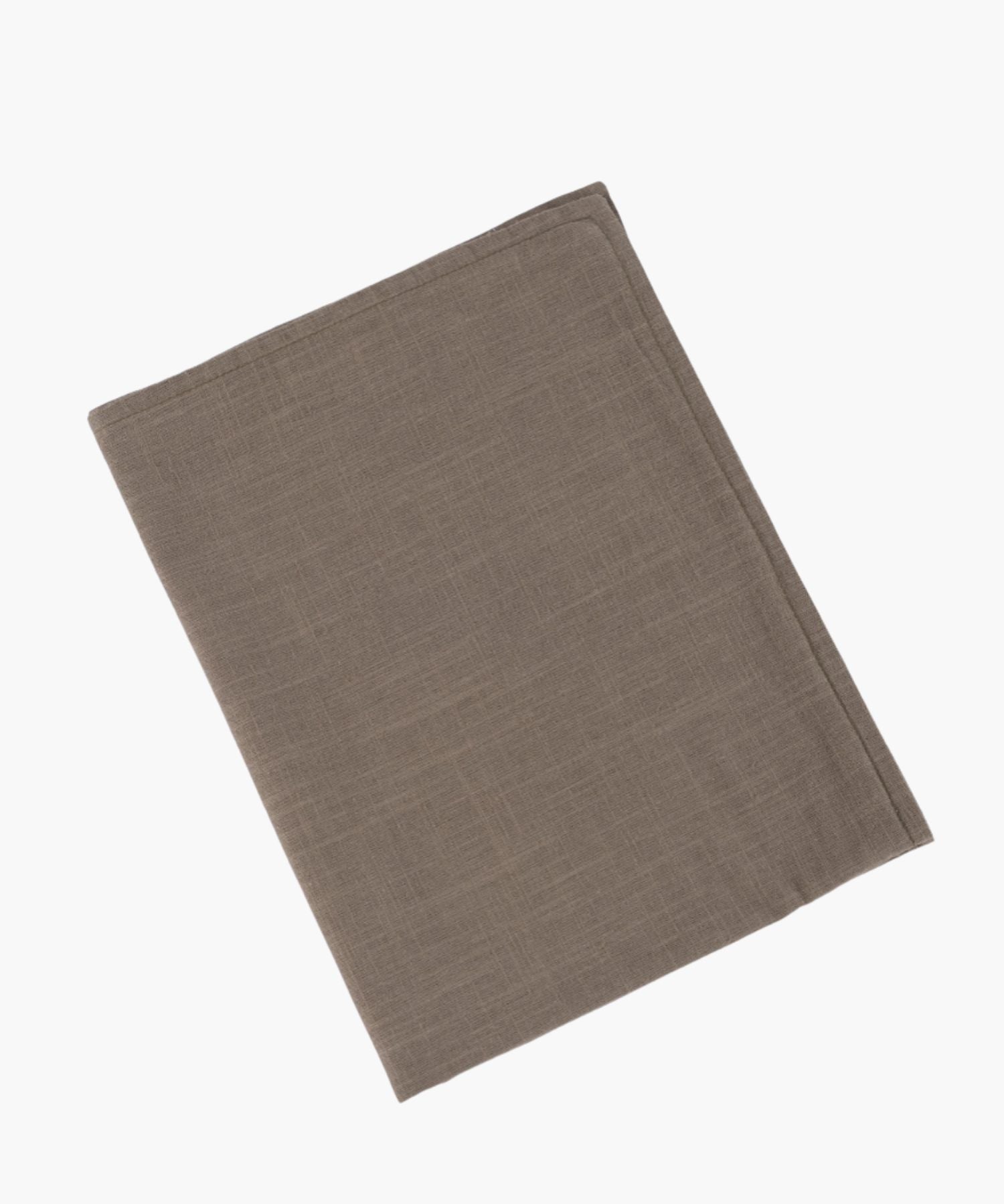 Brown fabric square on a white background