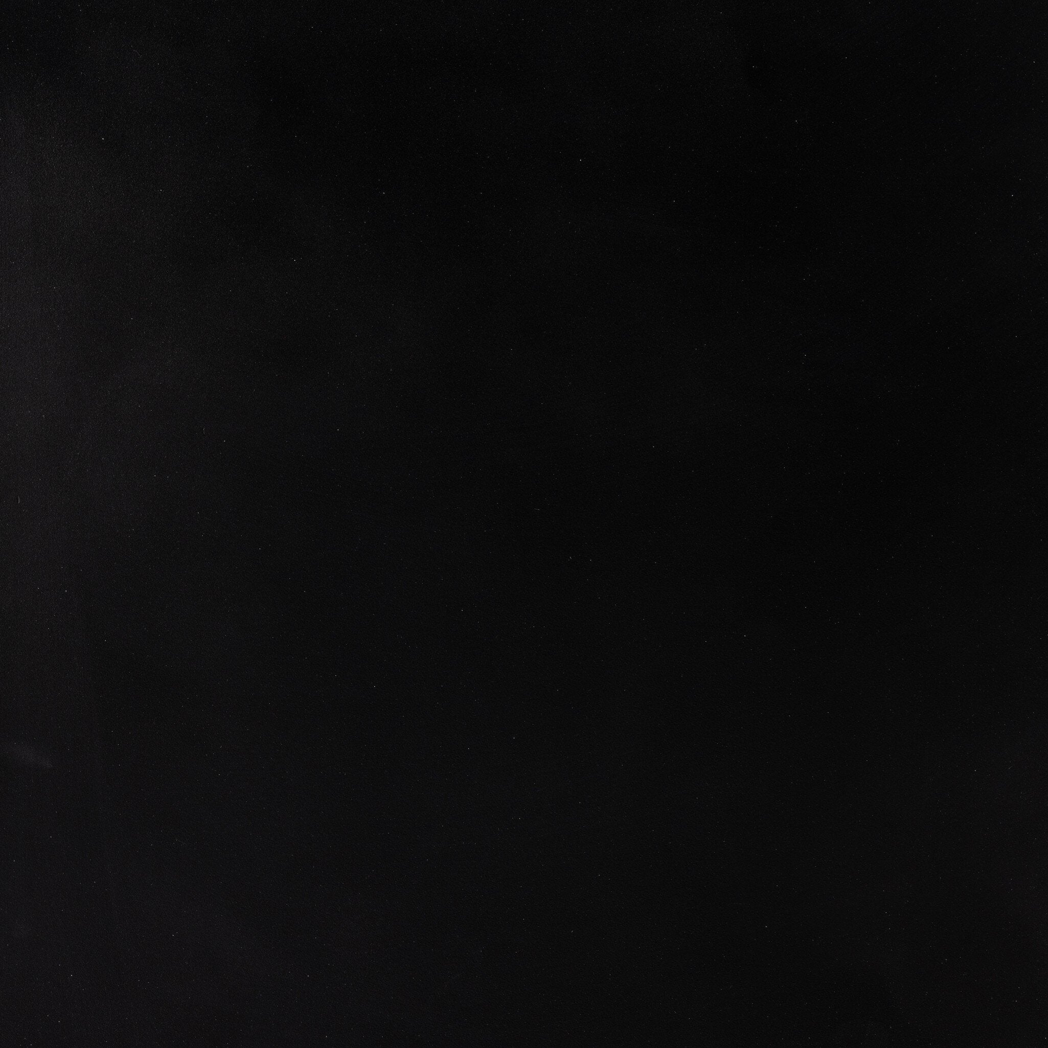 Close up of the dresser showing its black finish. 