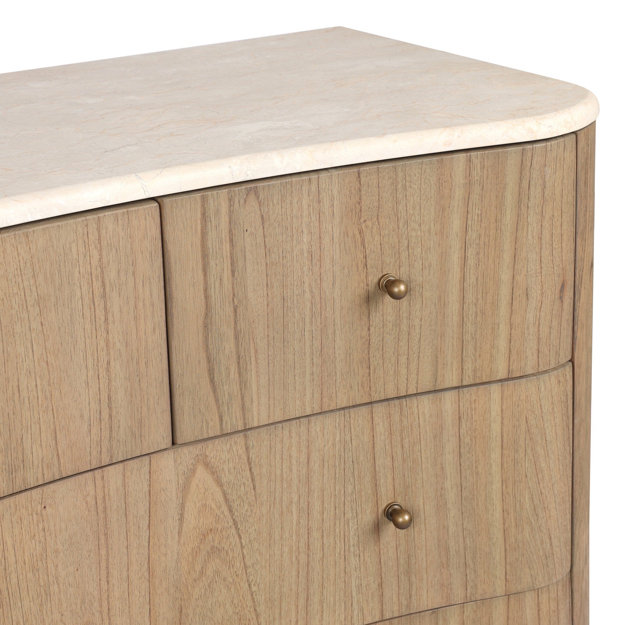 A close up of wooden dresser with multiple drawers and a cream-white marble top on a white background.