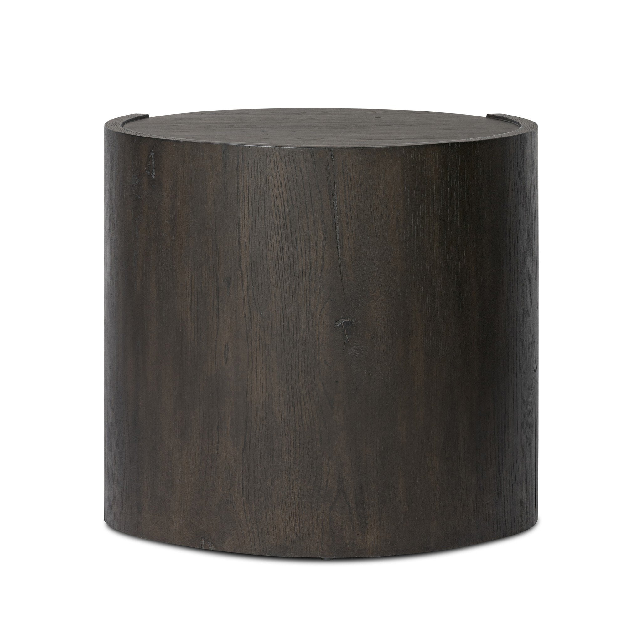The back of a round dark wooden nightstand with a drawer and a cubby on a white background.