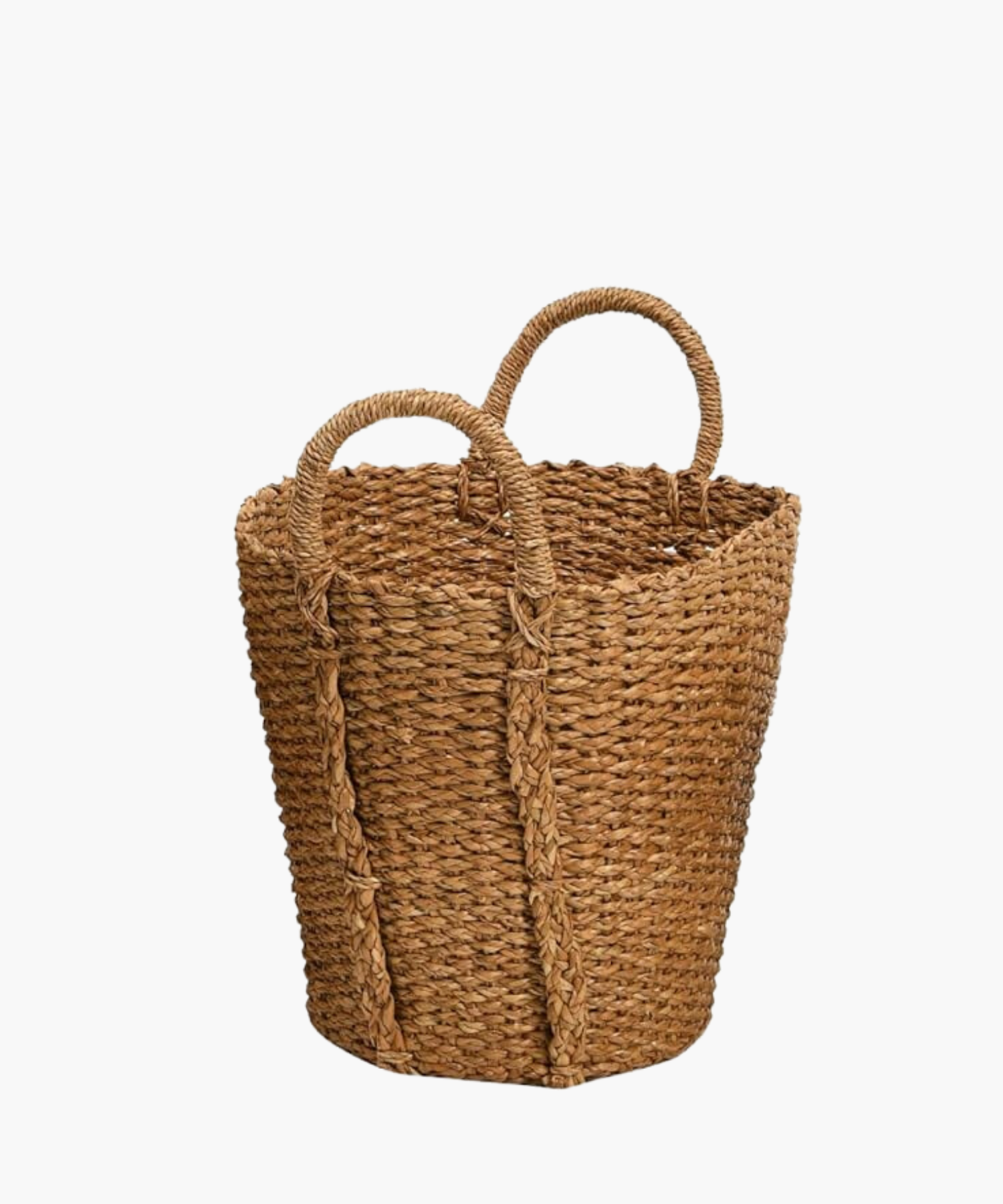 A  hand woven basket with two sturdy looped handles. The basket's braided texture conveys a rustic and natural feel, perfect for storage or decoration. | Wildwood Home Co.