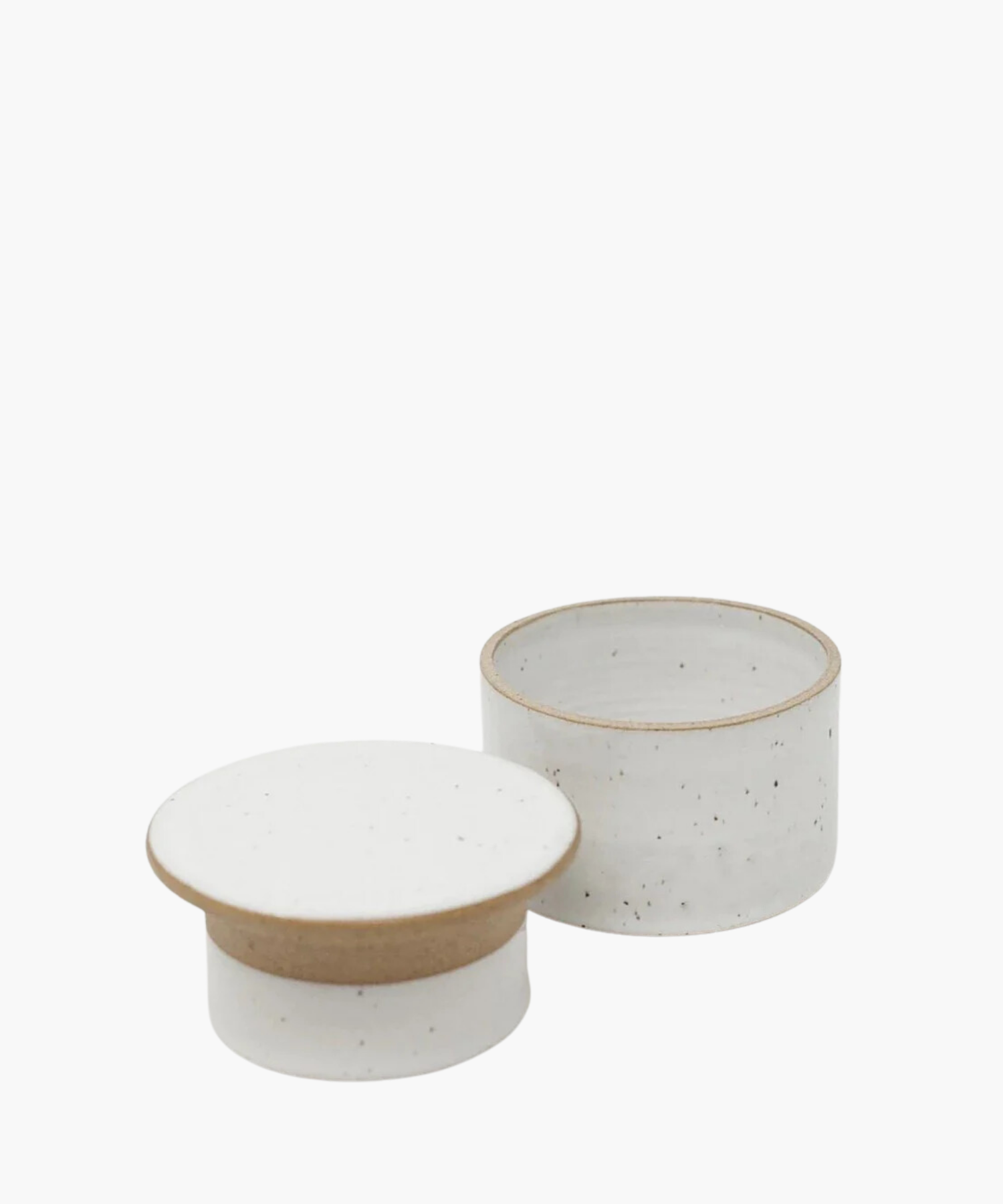 Speckled white ceramic butter keeper featuring light brown edges. The minimalist design exudes a clean, modern aesthetic. | Wildwood Home Co.