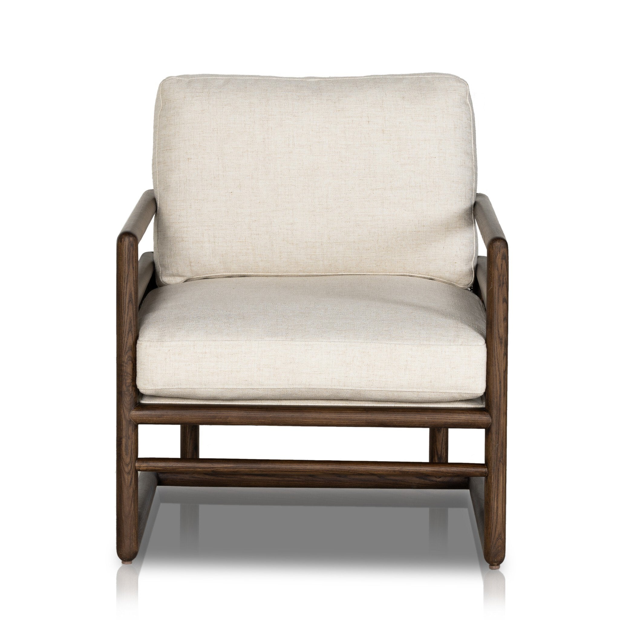 Chair with neutral linen fabric, cane panels with open rounded framing. | Wildwood Home Co.