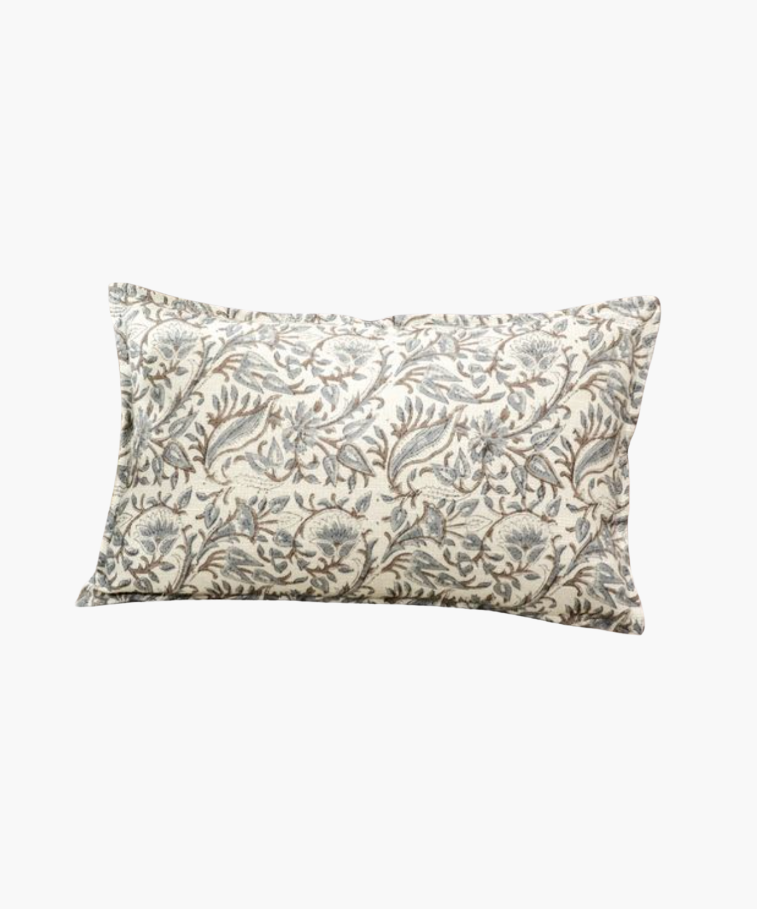 A lumbar pillow with a detailed floral pattern in muted blue and brown tones on a cream background, conveying an elegant and cozy feel.