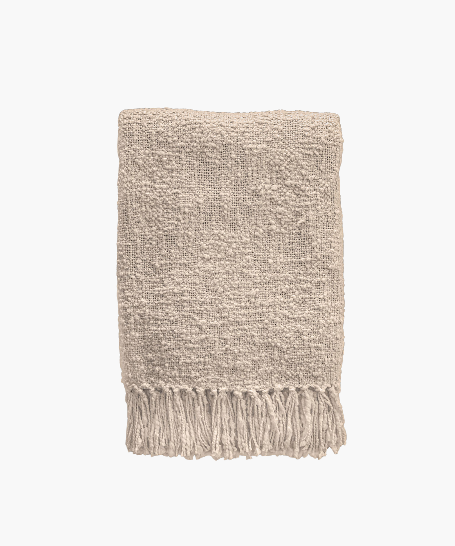 A beige colored woven throw blanket with a textured pattern and fringed edges, conveying a cozy and inviting feel. | Wildwood Home Co.
