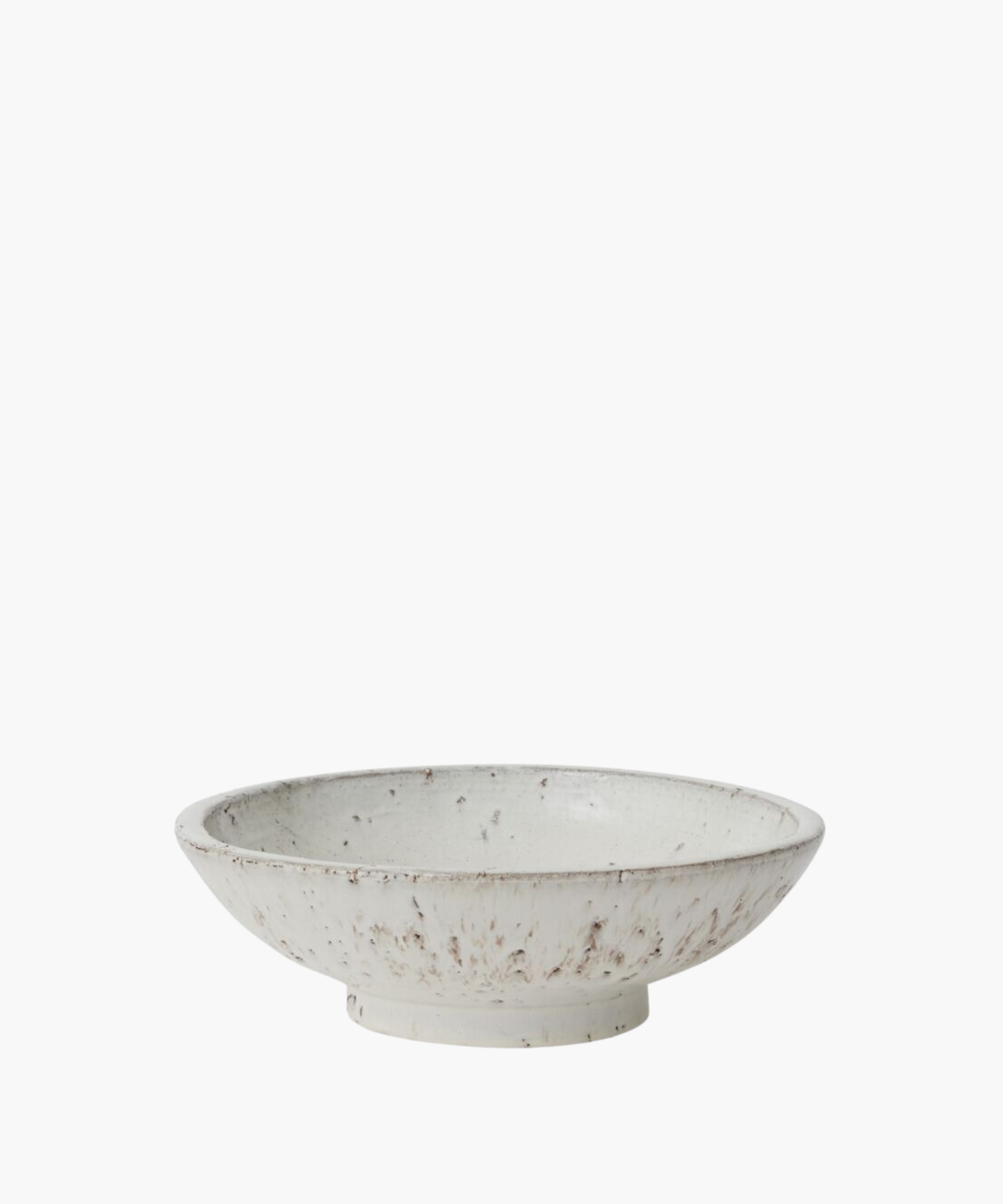 A rustic ceramic bowl with a wide, shallow design, featuring a white glaze speckled with earthy brown tones. The handcrafted look conveys a cozy, artisanal feel. | Wildwood Home Co.