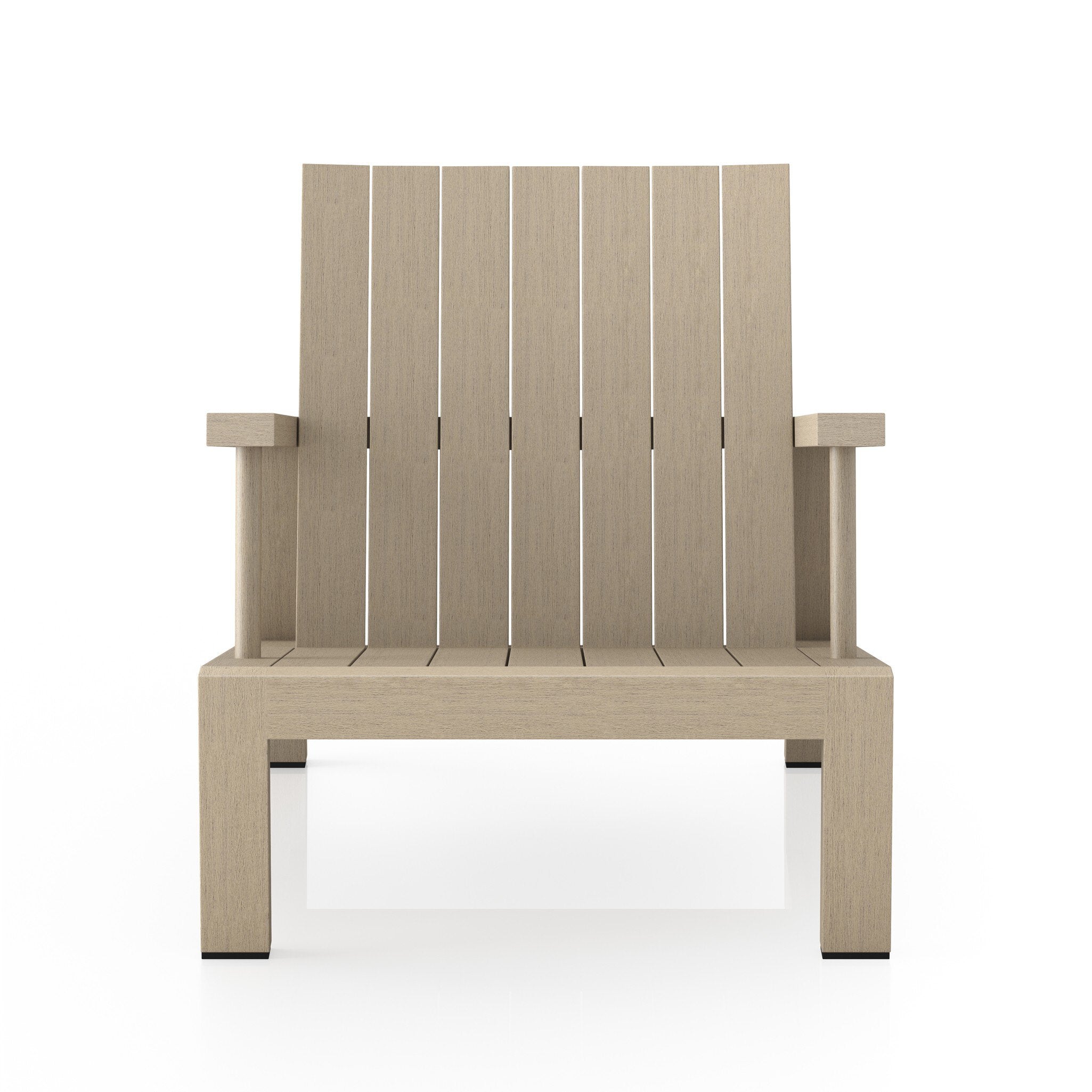 An Adirondack inspired outdoor chair made of teak with a wide angled frame with linear lines. | Wildwood Home Co.