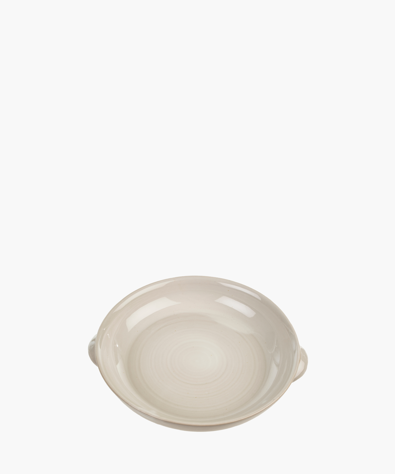 A smooth, beige ceramic bowl with subtle concentric circles and two small handles, conveying simplicity and elegance. The tone is minimalistic. | Wildwood Home Co.