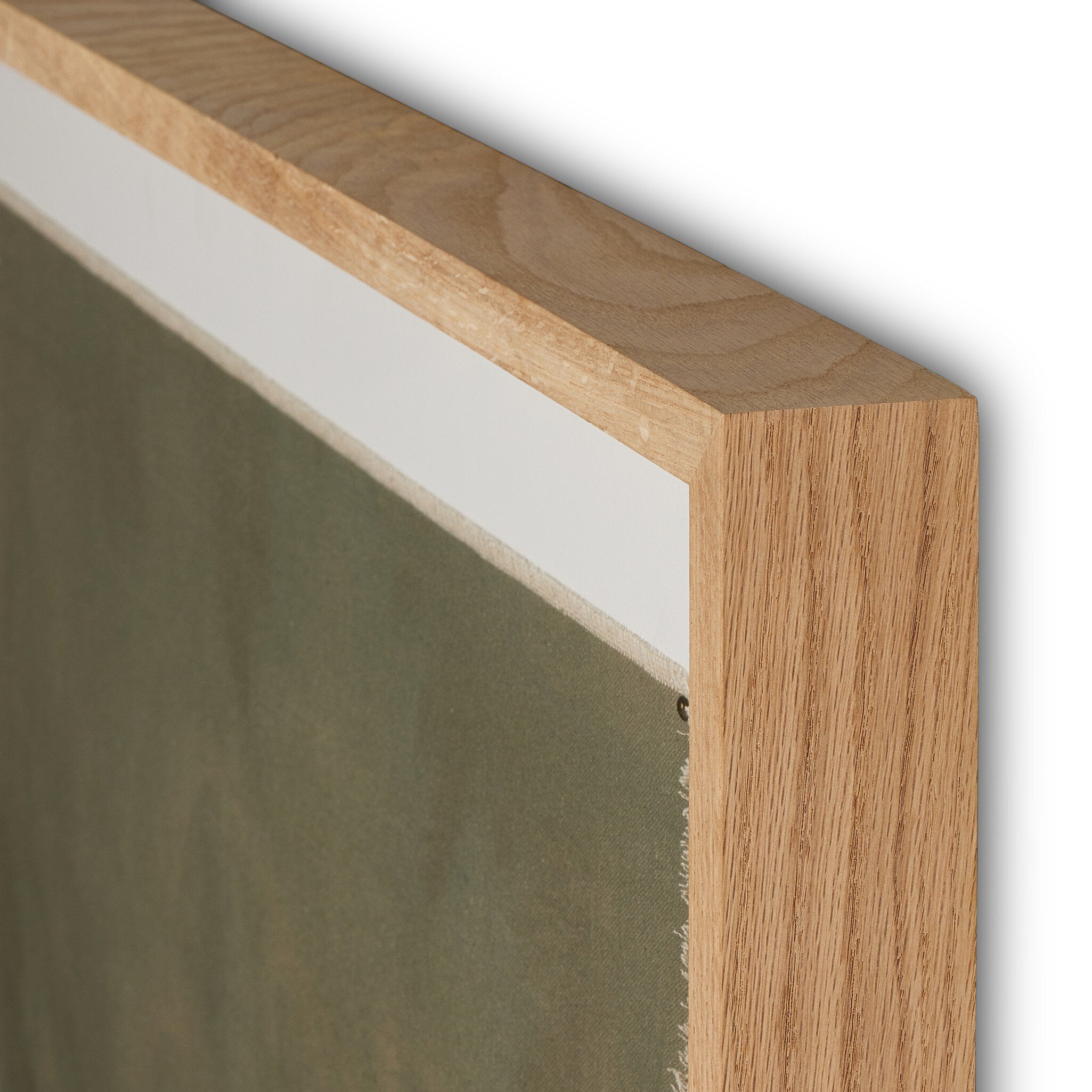 Close-up of a wooden frame corner on a white background