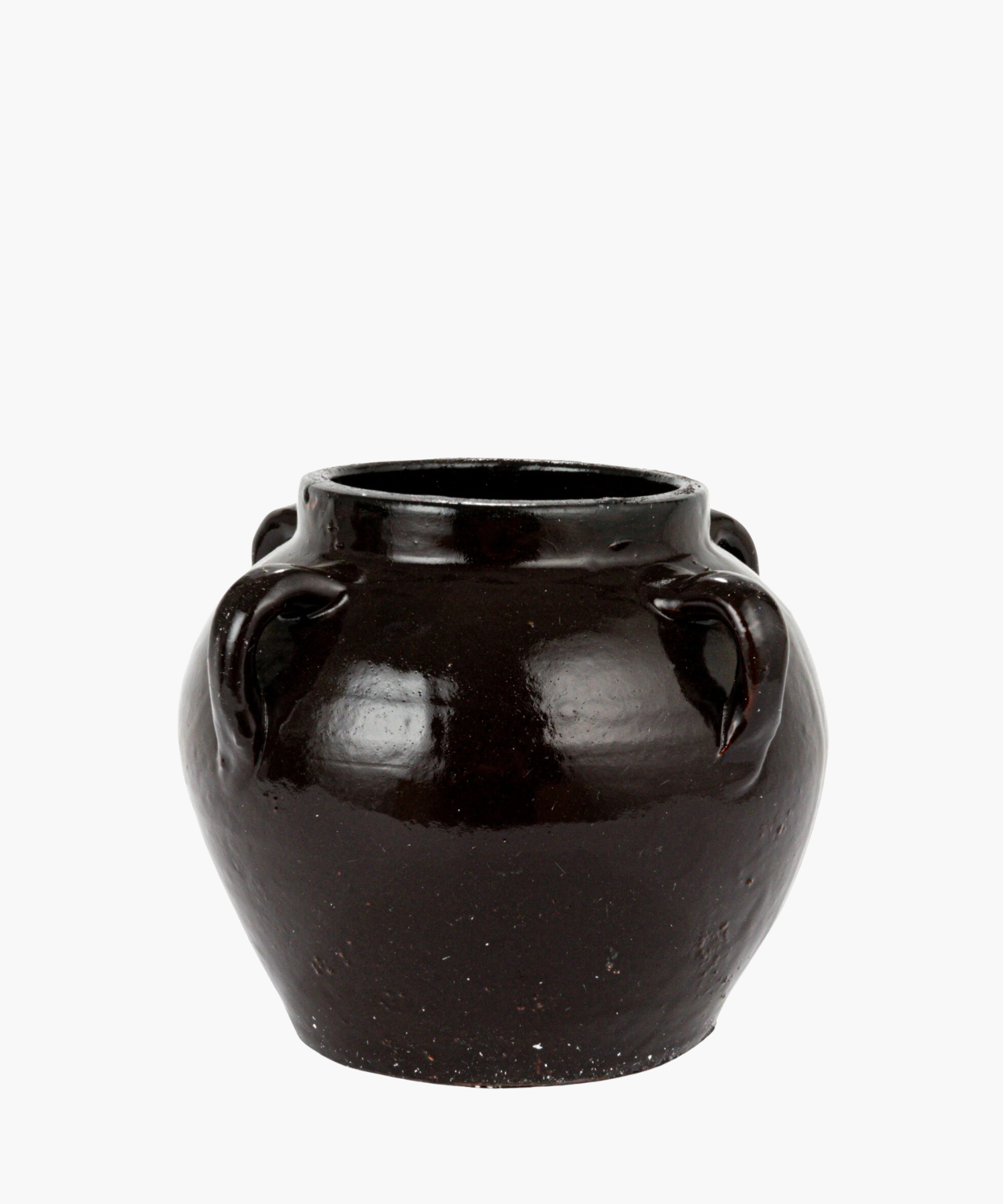 A small vintage-inspired shiny, black ceramic pot with a wide, rounded body and a narrow open top. It features four delicate small loop handles and a smooth surface. | Wildwood Home Co.