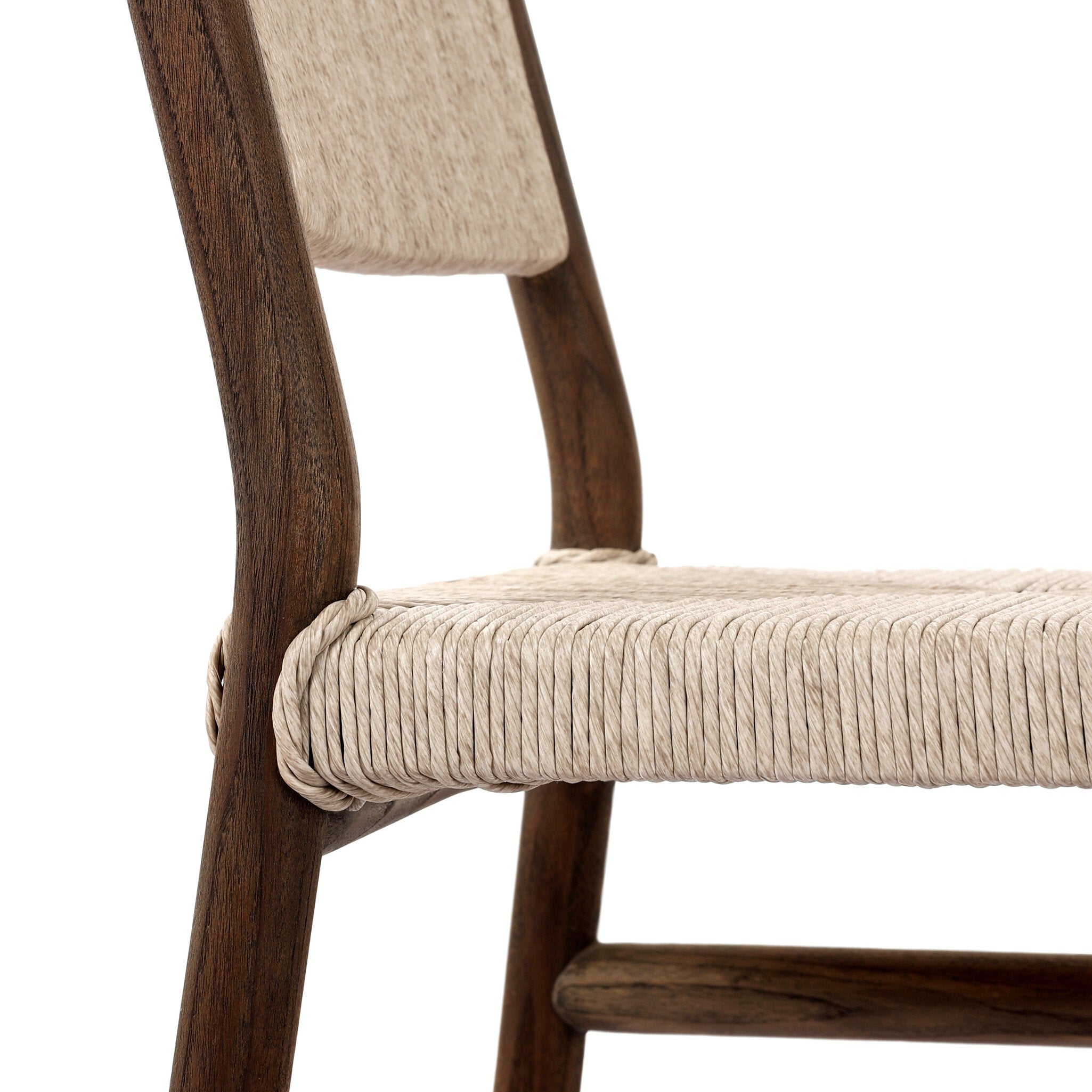 A close up side profile view of a shaker style outdoor dining chair with a dark brown wood frame and light brown woven seat and back on a white background. 
