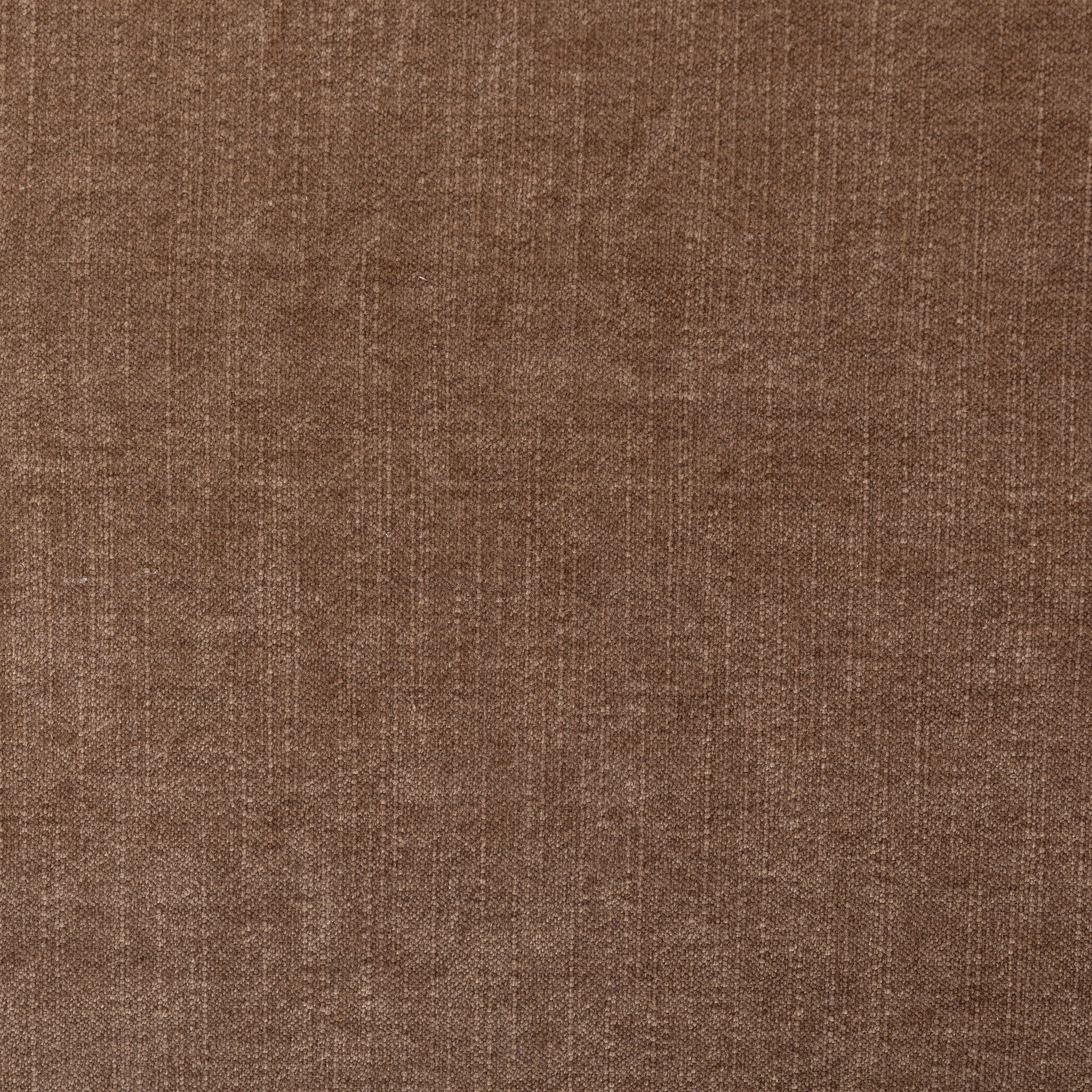 Close up of a brown upholstered bench texture. 