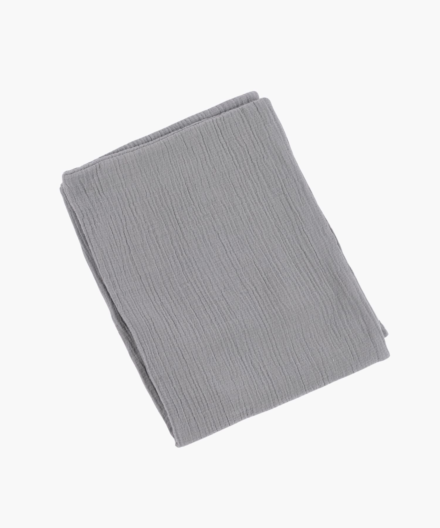 Folded cotton duvet cover in grey with a soft crinkle texture and knife edge finish, offering a minimal, airy feel. | Wildwood Home Co.