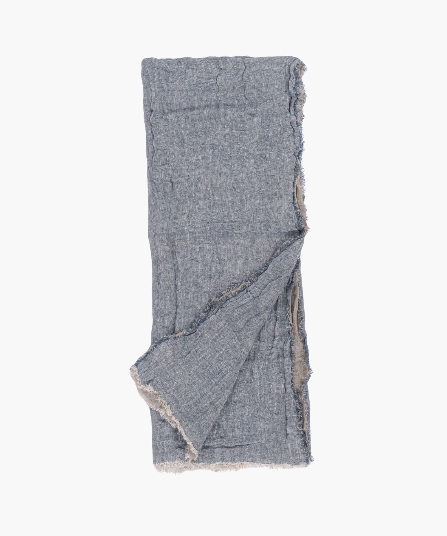 Flat lay of the Kent Super Throw in natural blue grey linen tone, highlighting its oversized linen gauze texture and soft fringed edges.