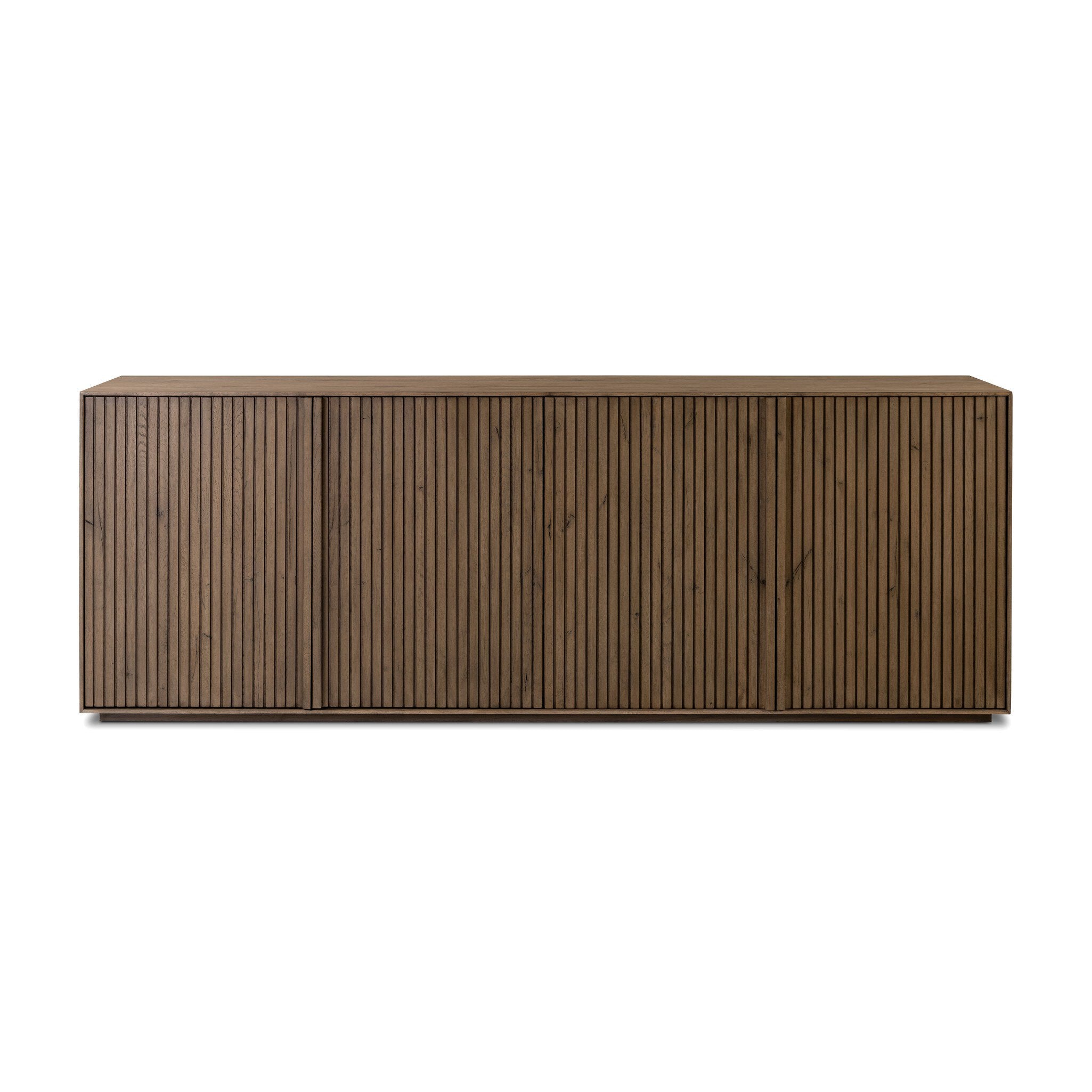 Wooden sideboard with vertical reeding on a white background. | Wildwood Home Co.