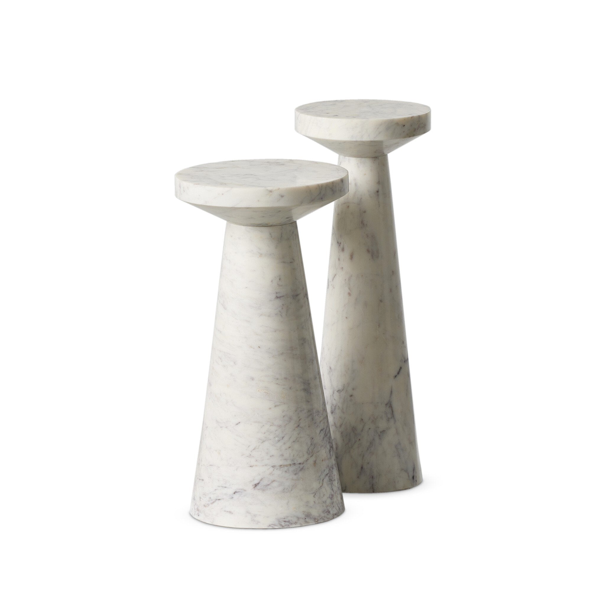 Two white marble nesting end tables with staggered heights on a white background.