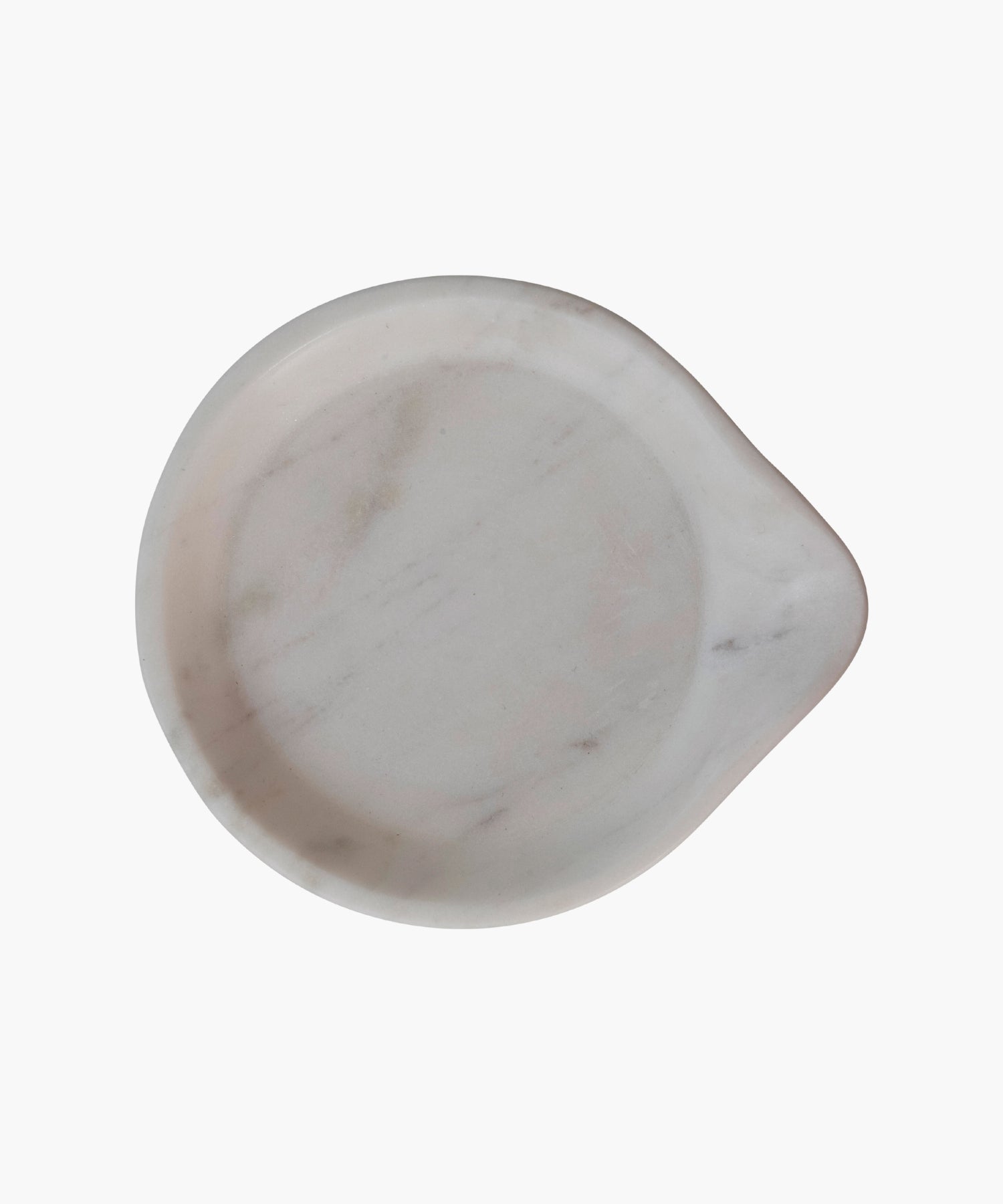 Overhead view of a smooth, round white marble dish or spoon rest. Its minimalist design and soft curves create an elegant, serene appearance. | Wildwood Home Co.