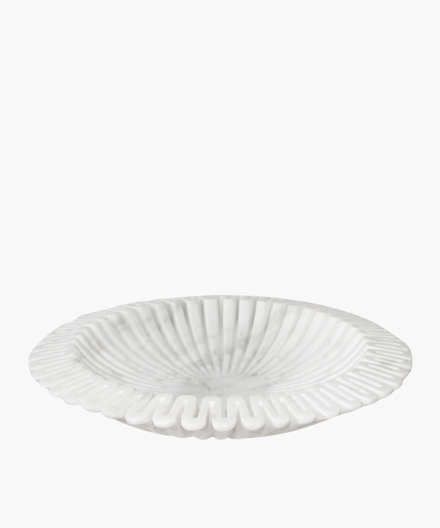White marble shallow bowl with a radial ribbed design and a scalloped edge, giving a sense of elegance and texture. The pattern is symmetrical and stylish. | Wildwood Home Co.