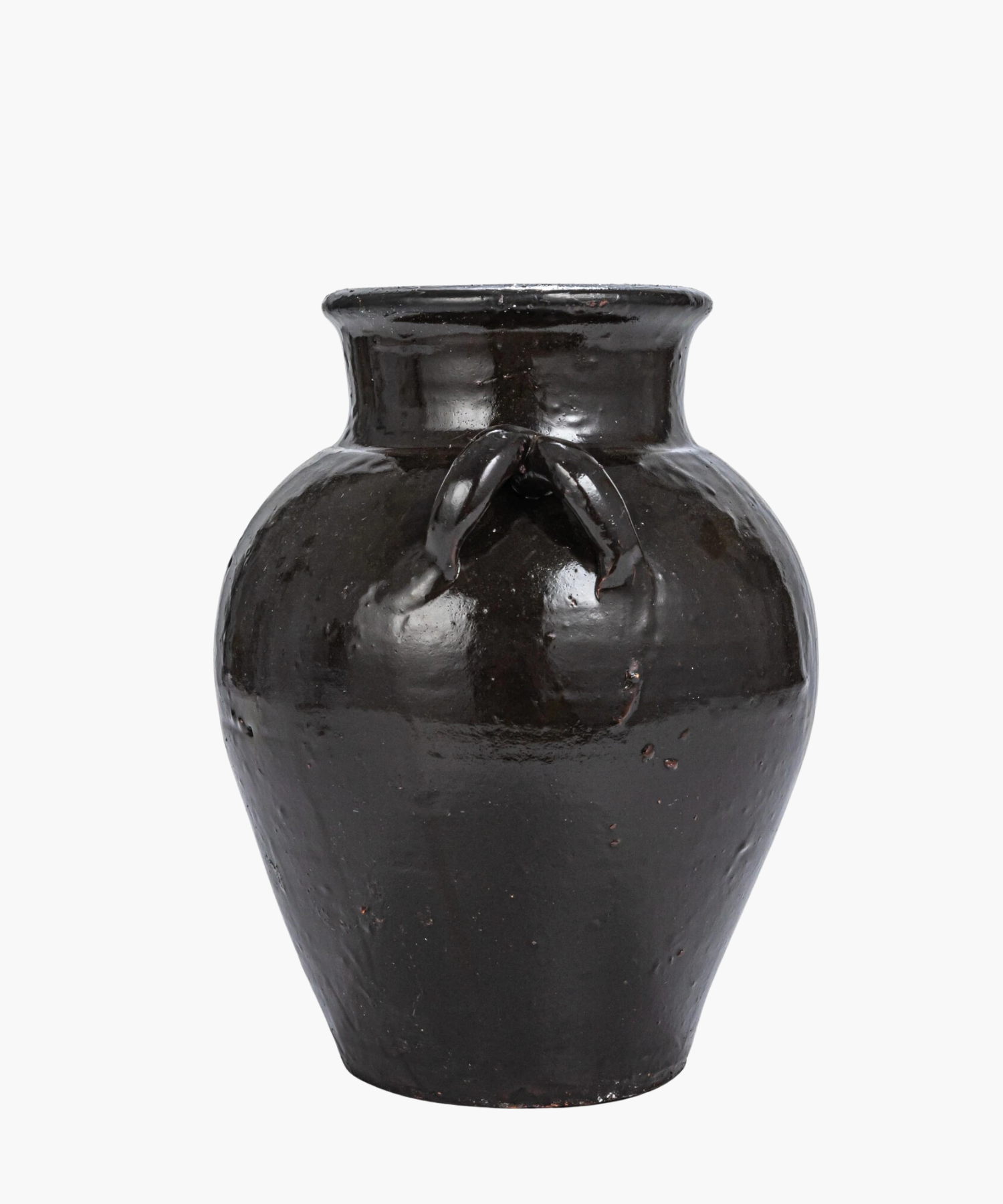 A large, glossy, black ceramic vase with two small side handles. The vase has a rounded body and a narrow neck, evoking an antique feel. | Wildwood Home Co.