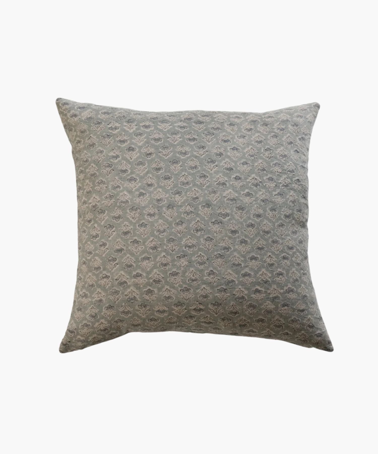 A square pillow with a subtle, intricate floral pattern in muted blue and gray tones. The design is elegant, conveying a calm and cozy atmosphere. | Wildwood Home Co.