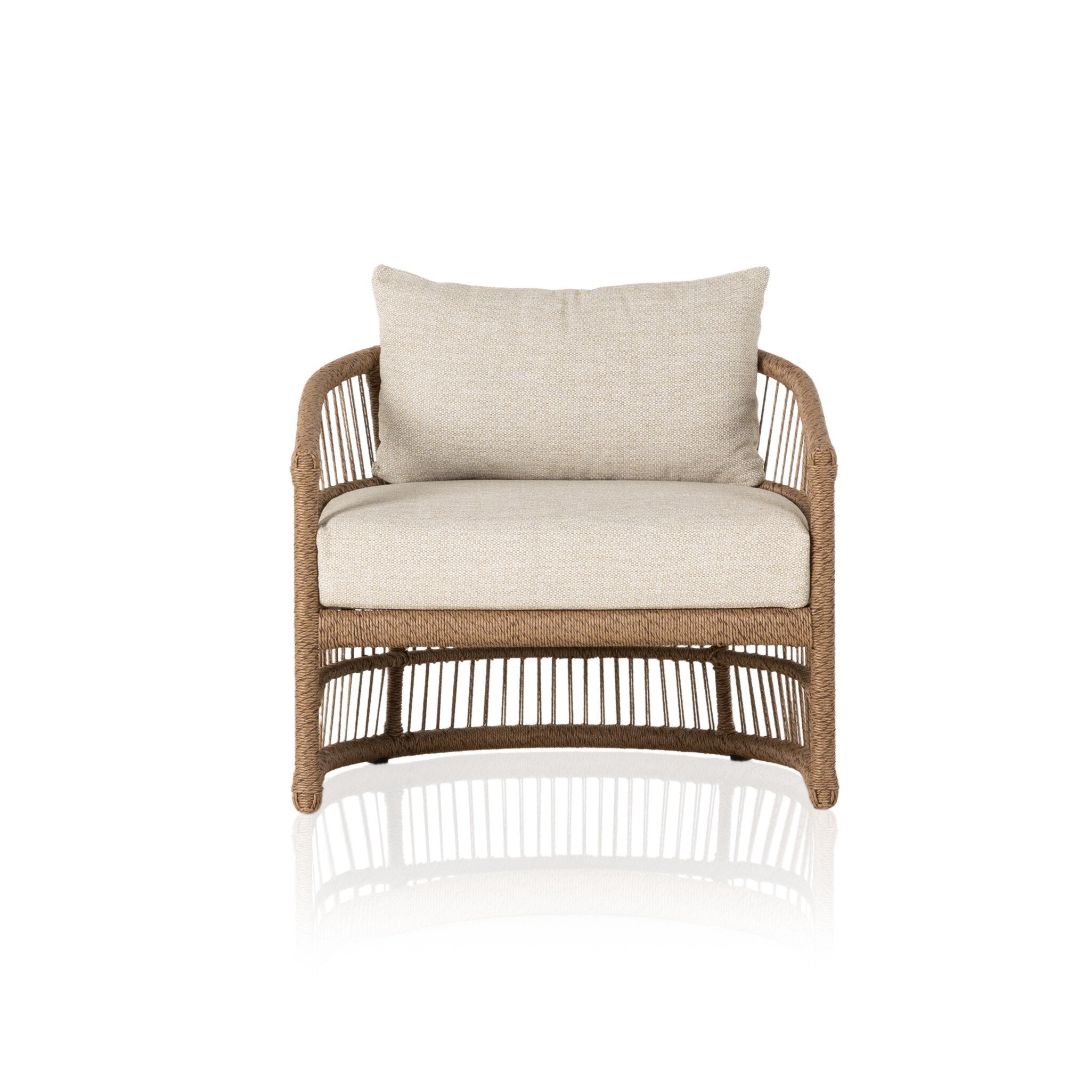 Cottage inspired outdoor chair with wrapping and texture along with beige colored upholstered cushions on a white background.  | Wildwood Home Co.