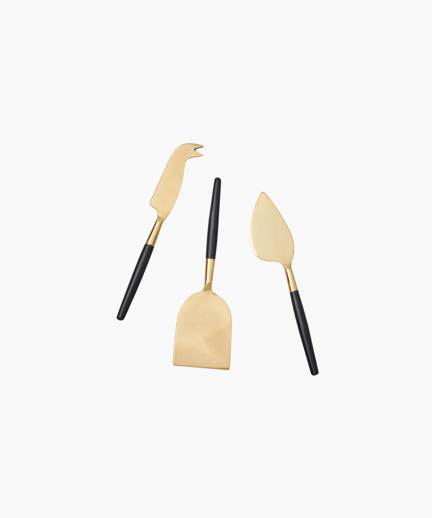 Three elegant cheese knives with gold blades and black handles are arranged on a white background, conveying a sleek and modern aesthetic. | Wildwood Home Co.