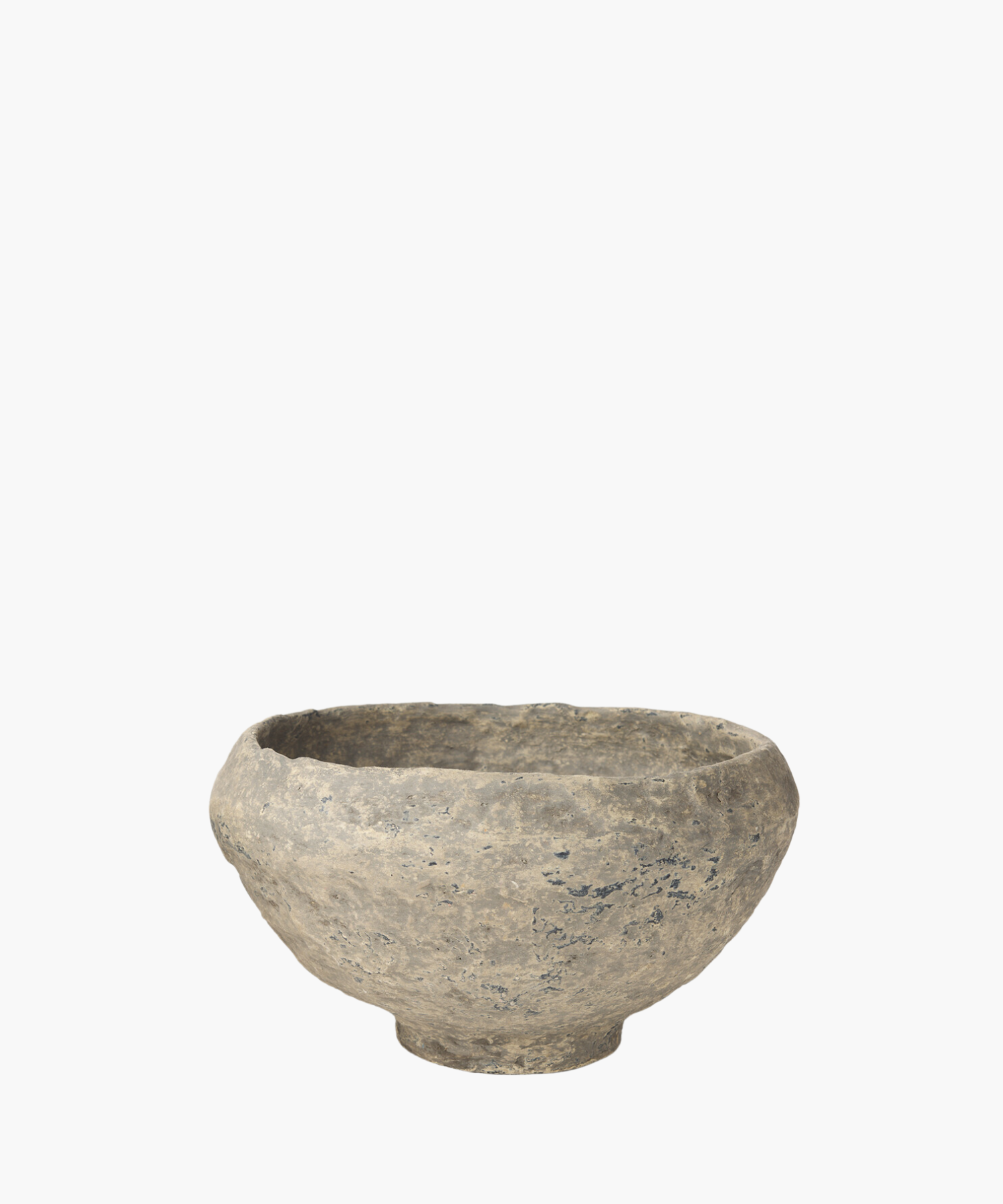 A rustic, paper mache bowl with a textured surface, showcasing shades of gray and subtle patches of darker tones. The bowl exudes an ancient, historical feel. | Wildwood Home Co.