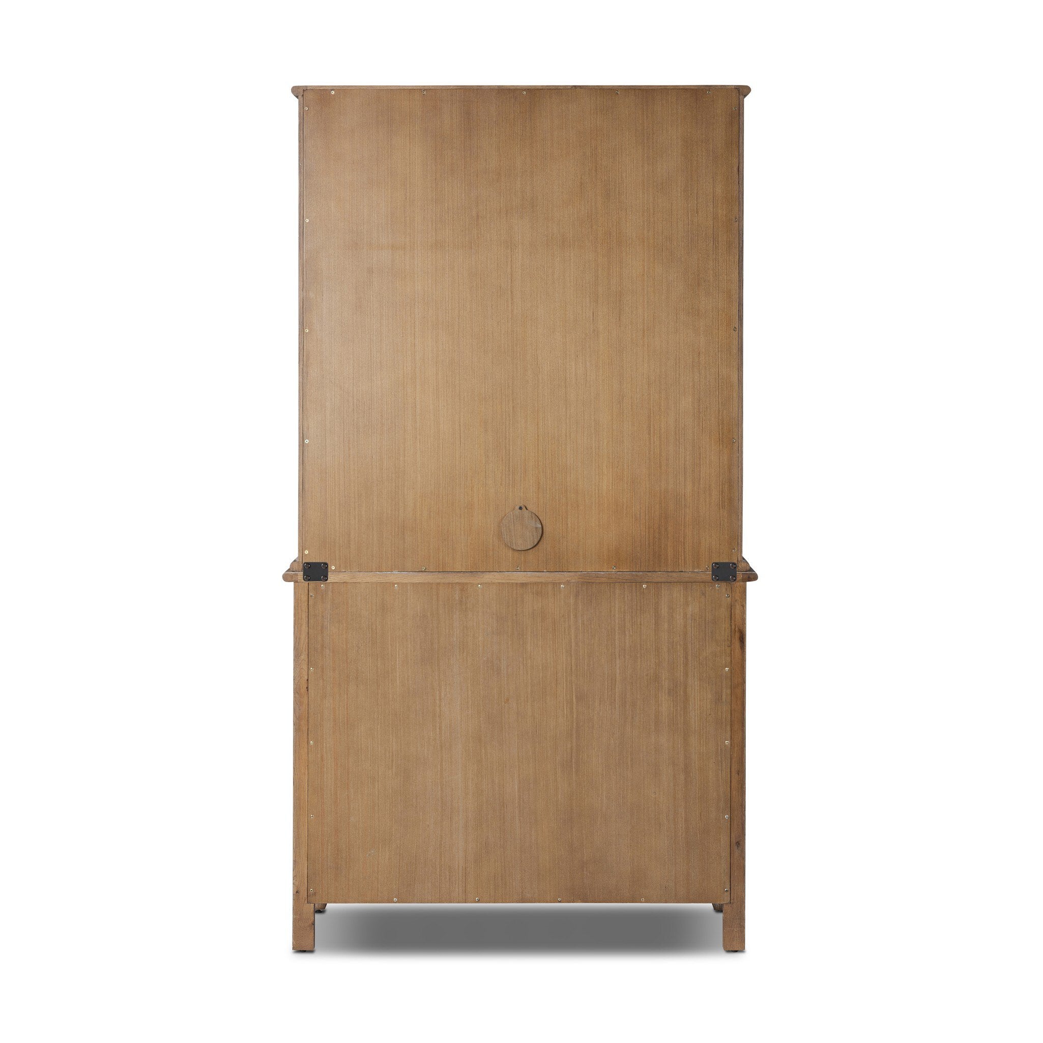 The back of a wooden armoire with two doors and four drawers on a white background.