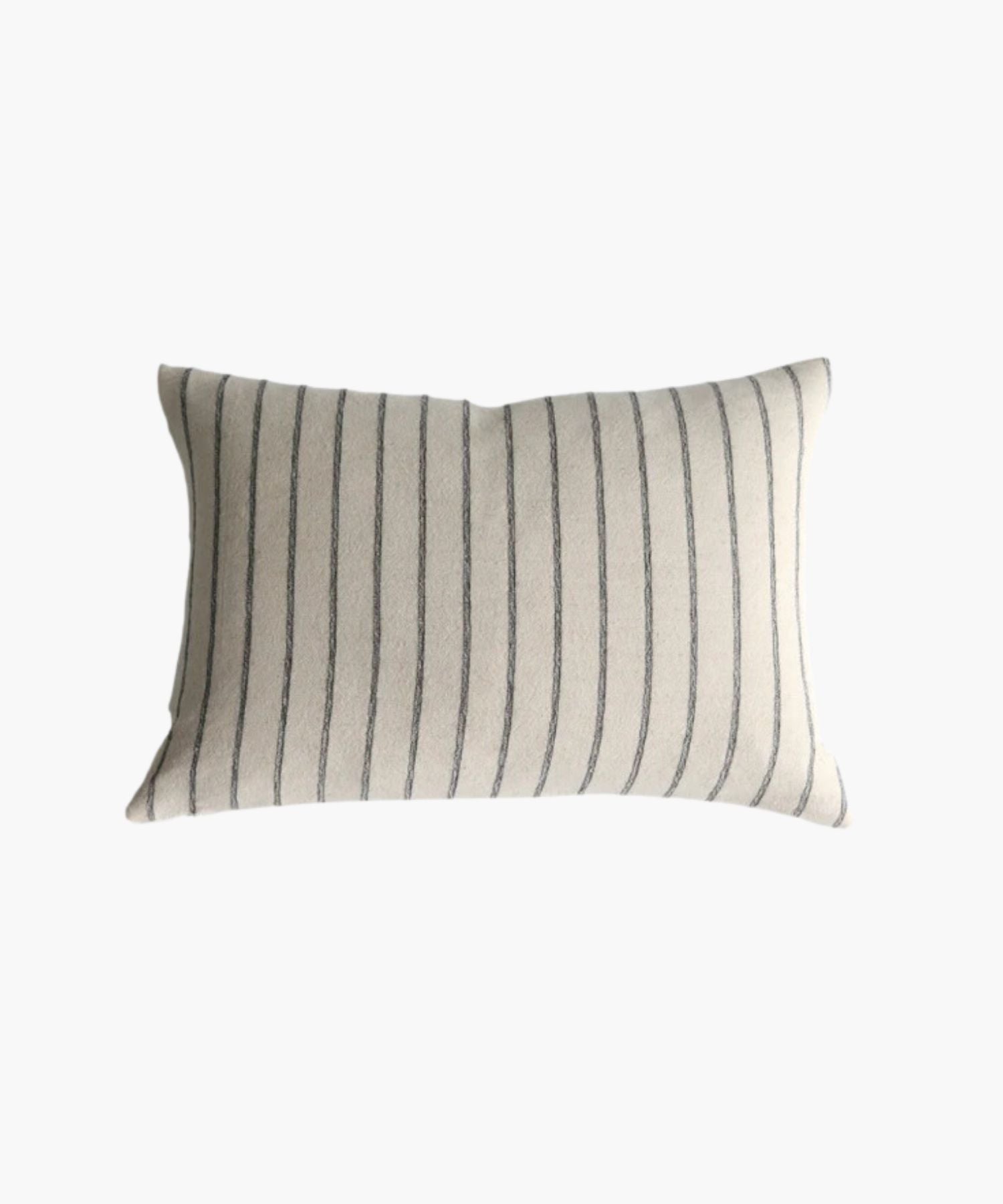 A rectangular or lumbar pillow cover with vertical black  woven stripes on a cream background. The pattern is simple and elegant, conveying a calm and cozy atmosphere. | Wildwood Home Co.
