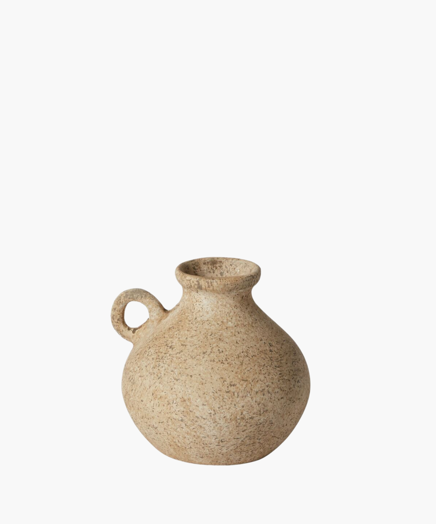 A rustic, beige ceramic jug with a round body and a small circular handle. Its textured surface gives an earthy, vintage appearance. | Wildwood Home Co.